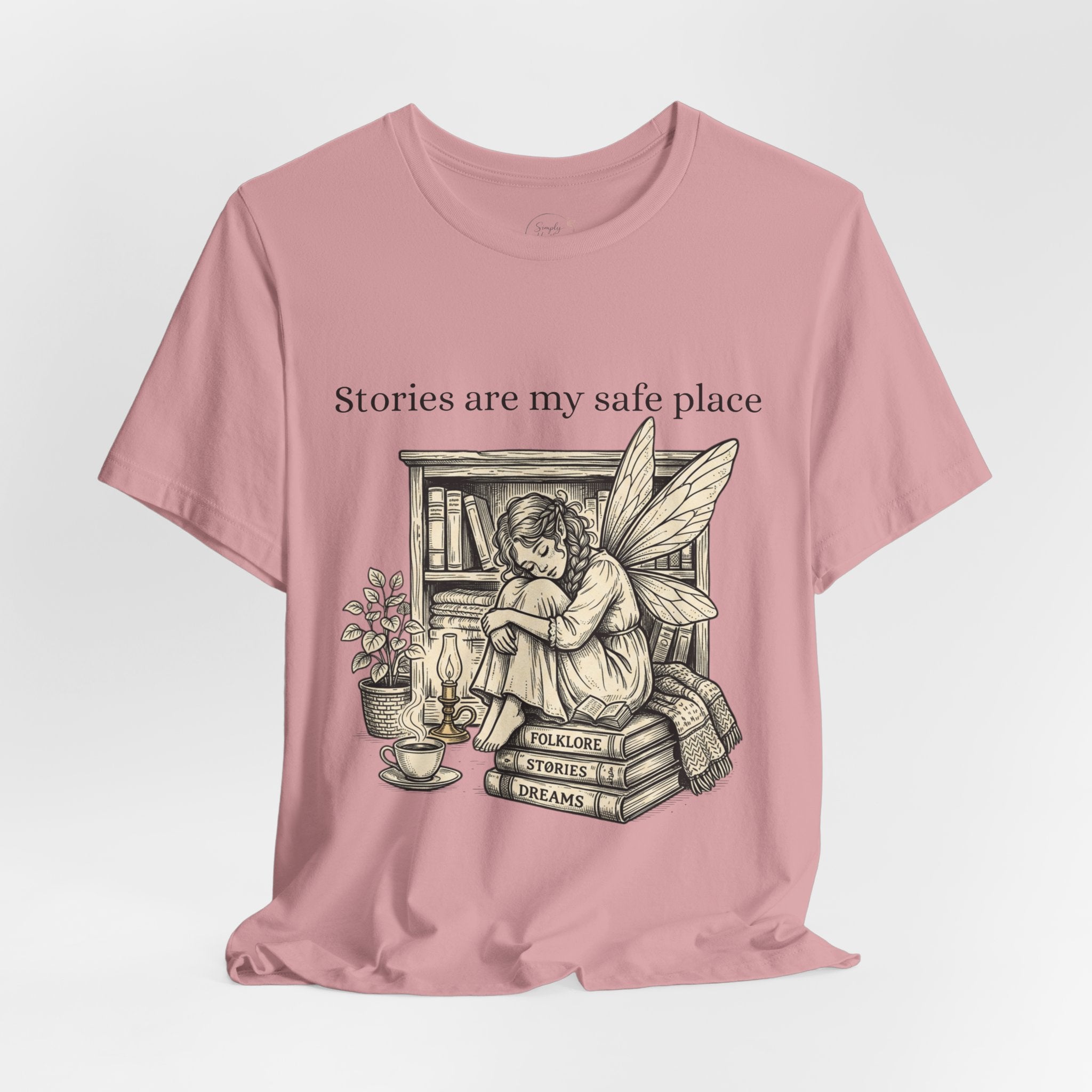 Fairy reading booklover T-shirt with "Stories Are My Safe Place" slogan, printed by Printify, casual apparel for book enthusiasts
