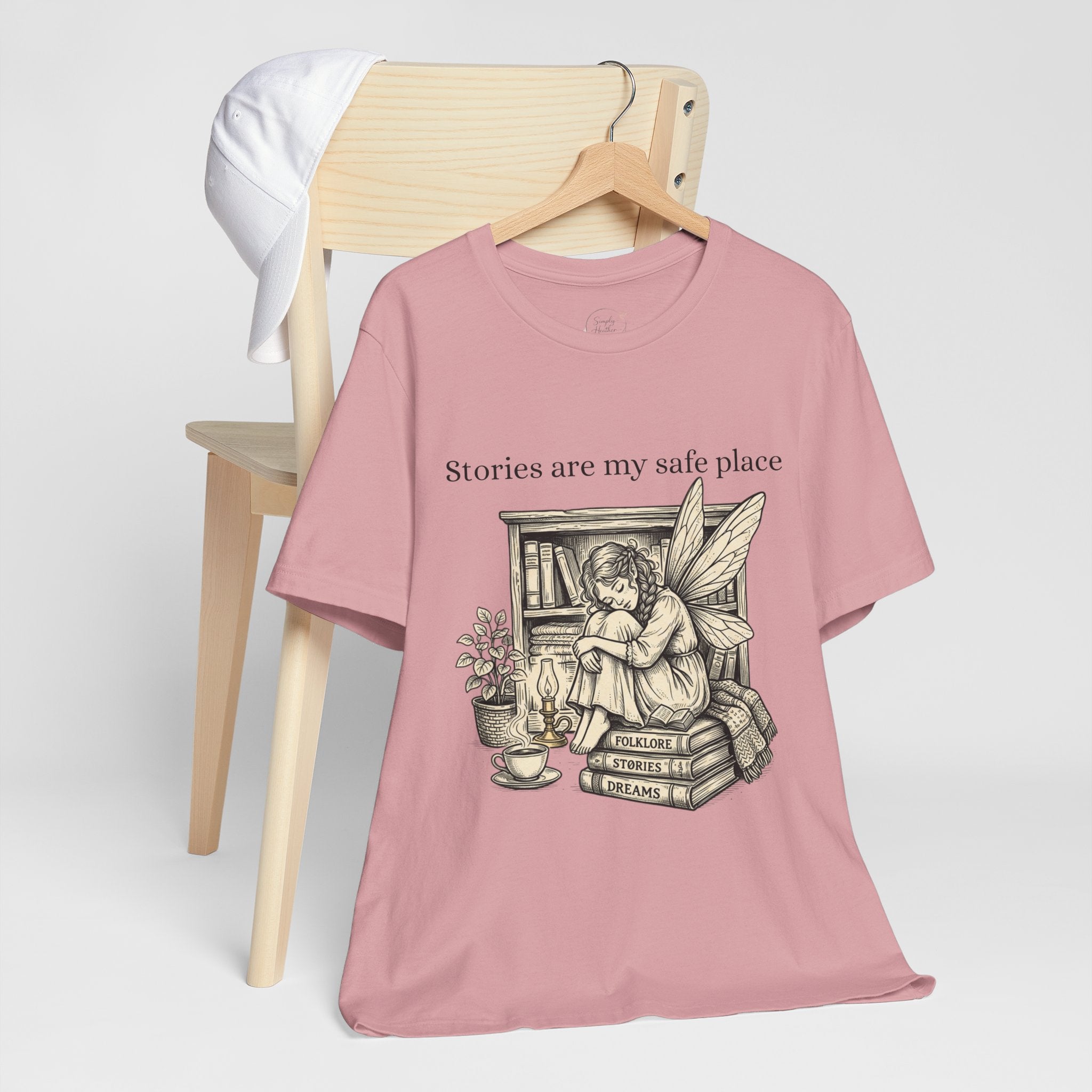 Fairy reading booklover t-shirt with "Stories Are My Safe Place" printed on a casual white Printify tee.
