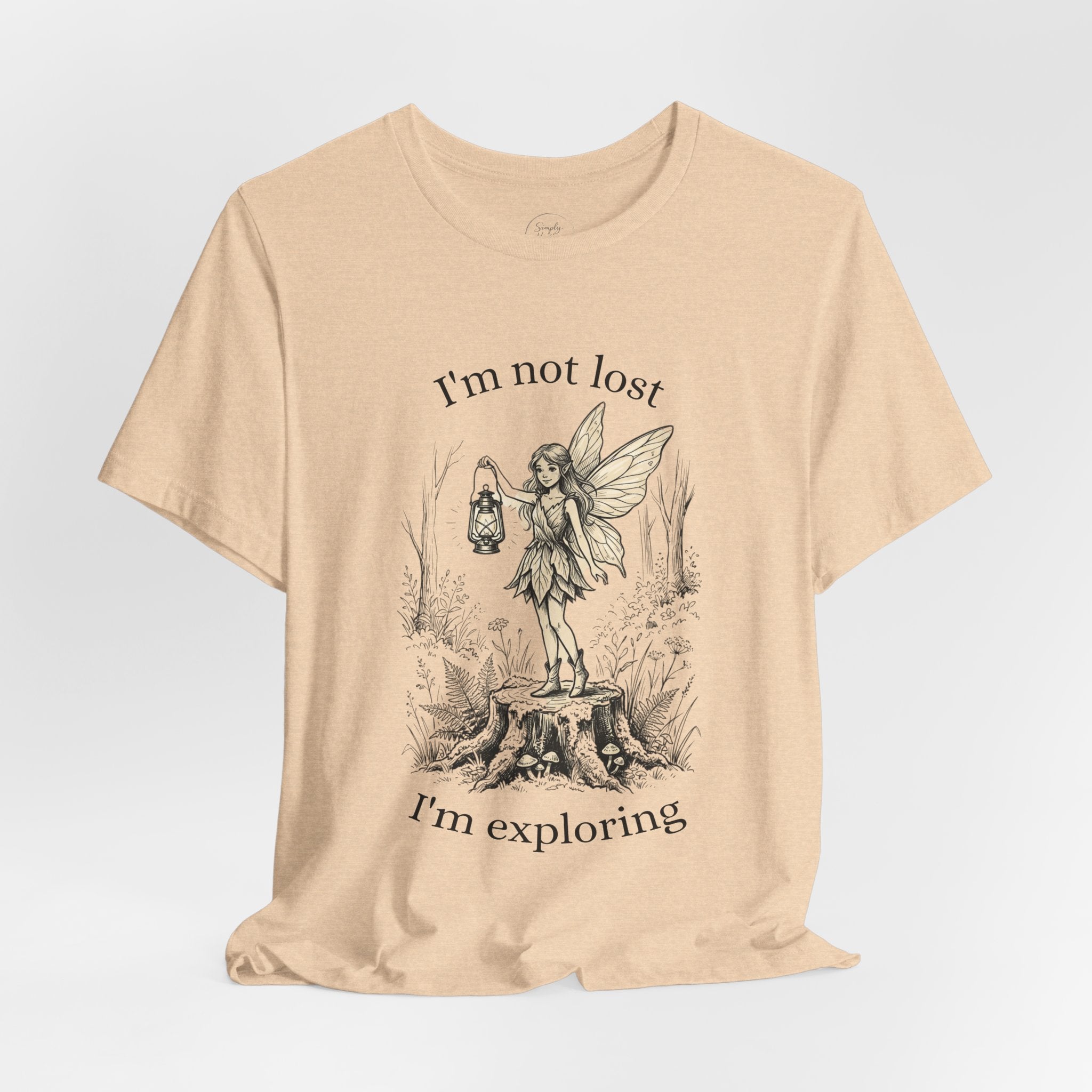Fairy Exploration Tee graphic T-shirt with "I'm Not Lost, I'm Exploring" text, casual cotton shirt in vibrant colors.