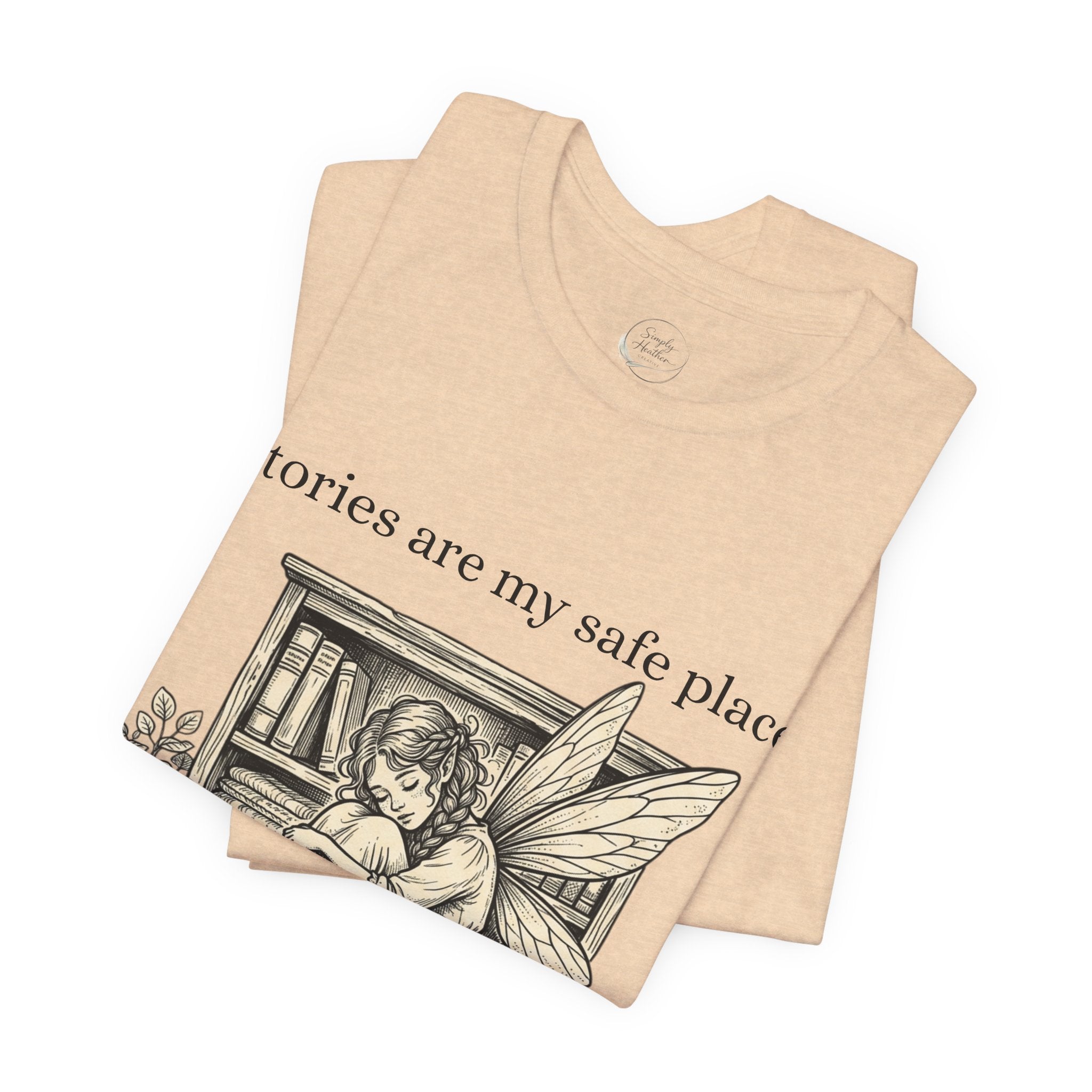 Fairy reading booklover T-shirt featuring "Stories Are My Safe Place" print, casual graphic tee for book enthusiasts.