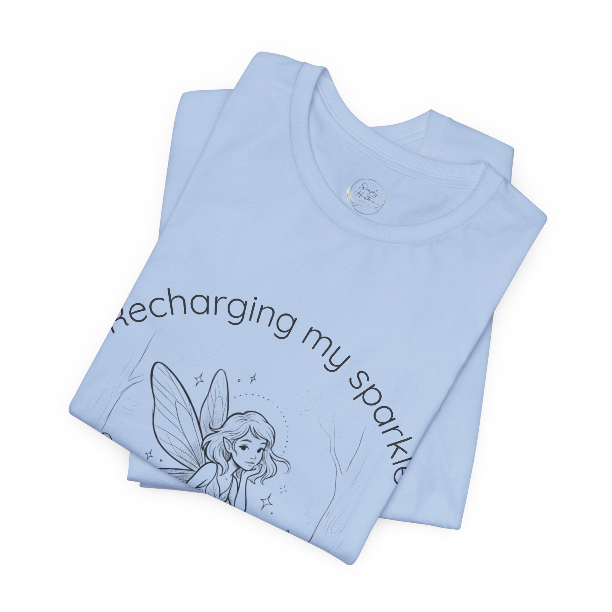 Vintage fairy graphic T-shirt with "Recharging My Sparkle" slogan, featuring whimsical fairy illustration on a casual Printify tee.