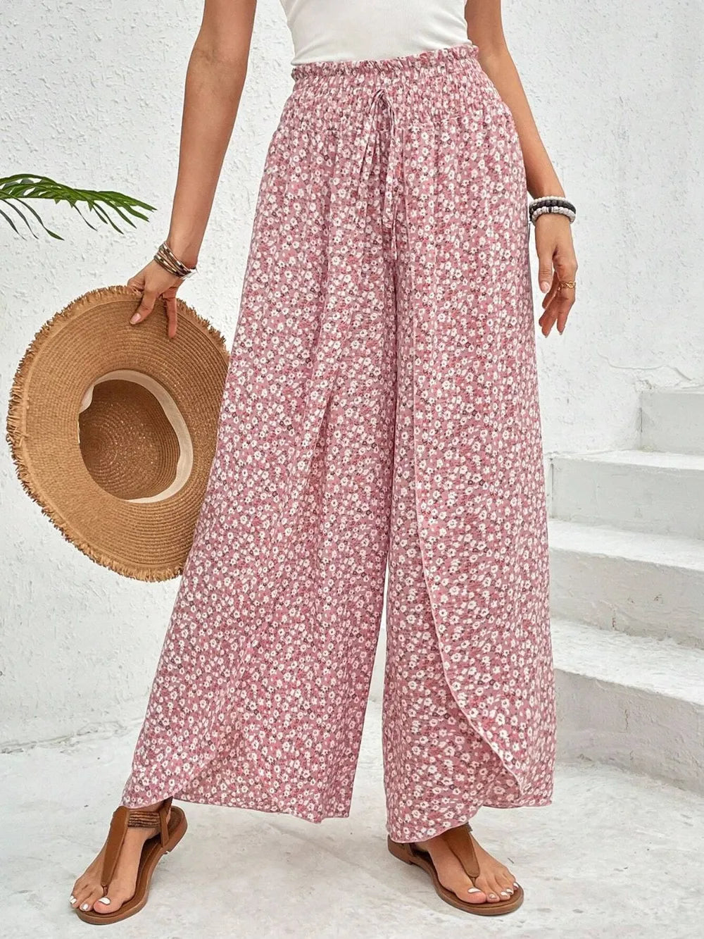 Whisperwind Tied Wide-Leg Pants by Trendsi featuring a dreamy printed flow design and relaxed fit, shown in a stylish full-length view.