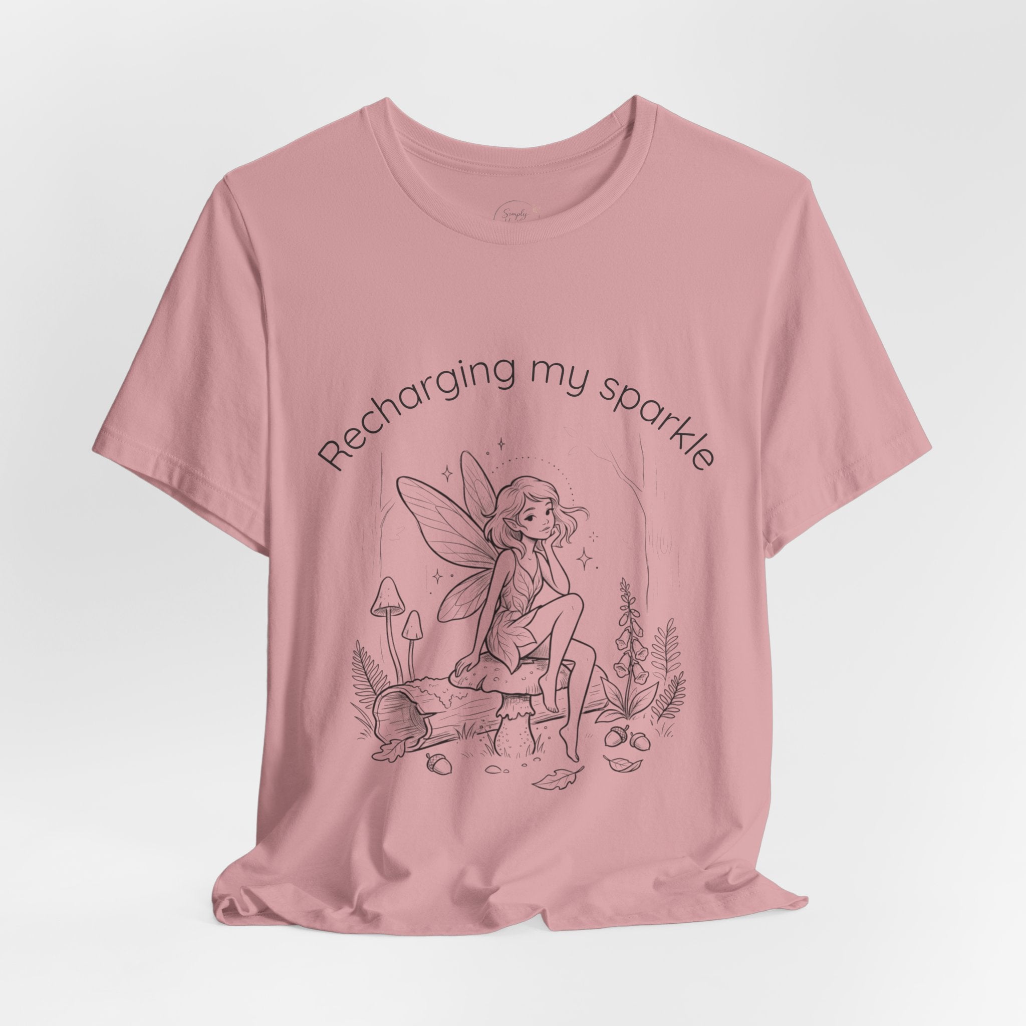 Vintage Fairy T-Shirt by Printify featuring a whimsical fairy graphic with the phrase “Recharging My Sparkle” on soft fabric.