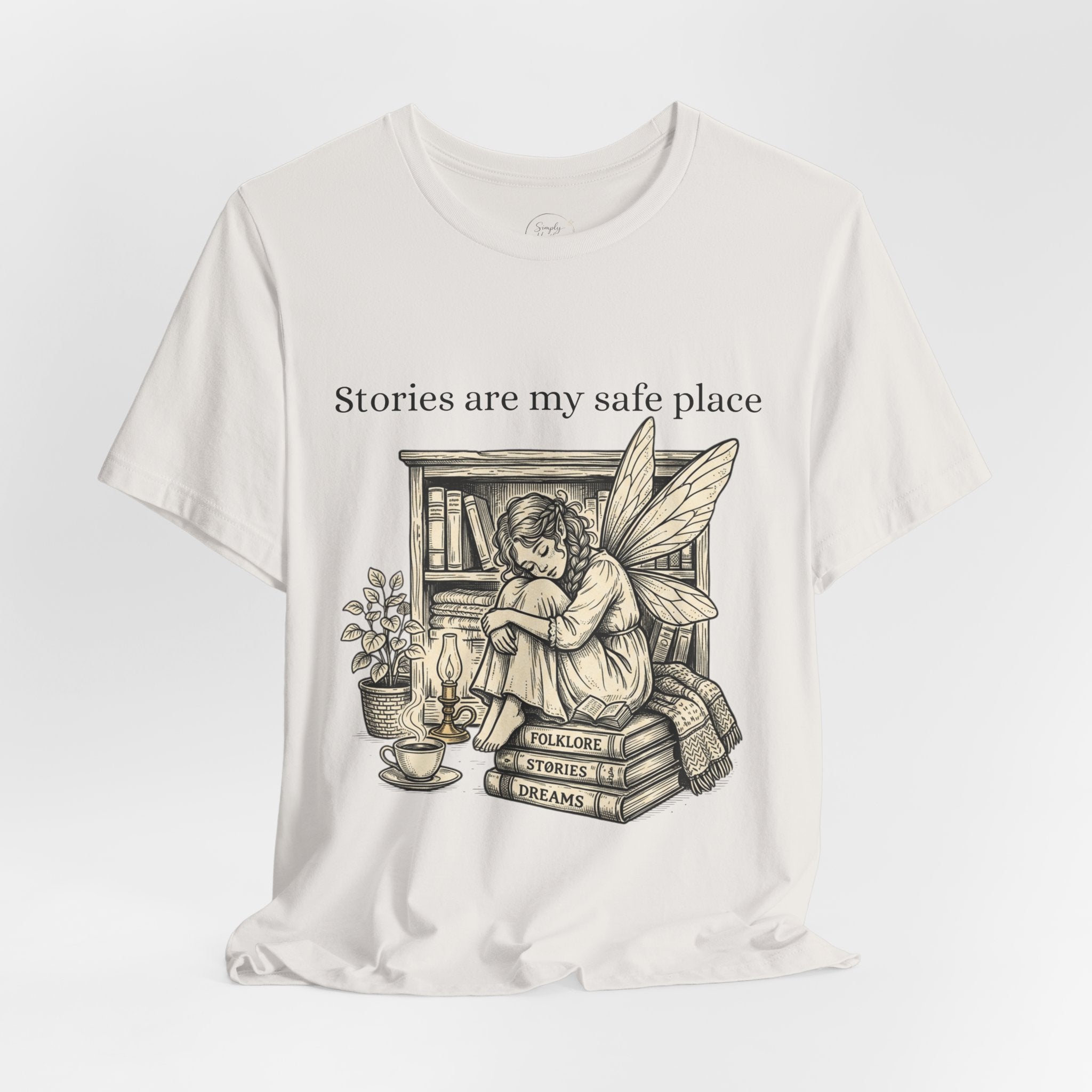 Fairy reading booklover T-shirt featuring "Stories Are My Safe Place" slogan, soft cotton fabric, casual fit, Printify brand.