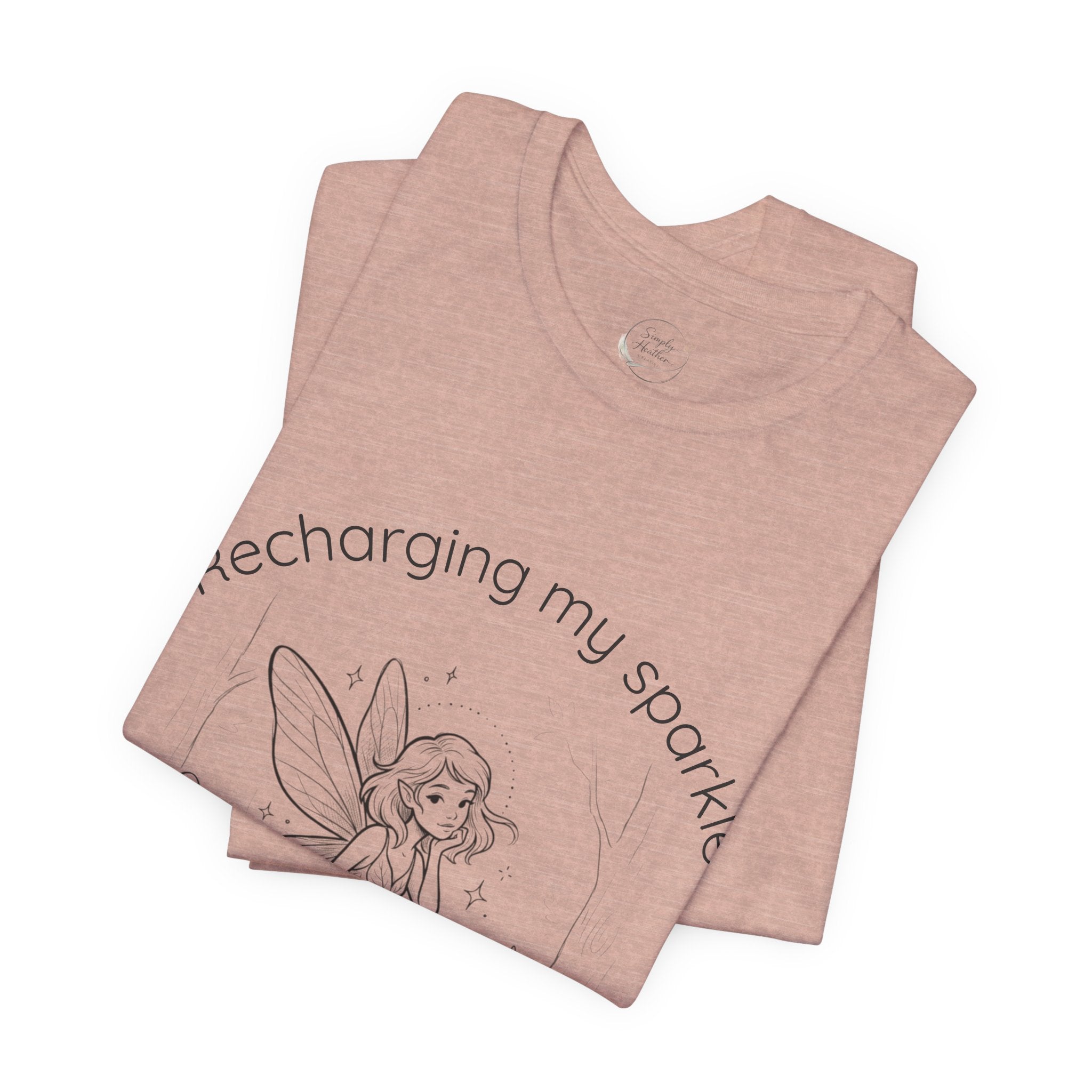 Vintage fairy graphic T-shirt with "Recharging My Sparkle" slogan from Printify, featuring a whimsical fairy illustration.