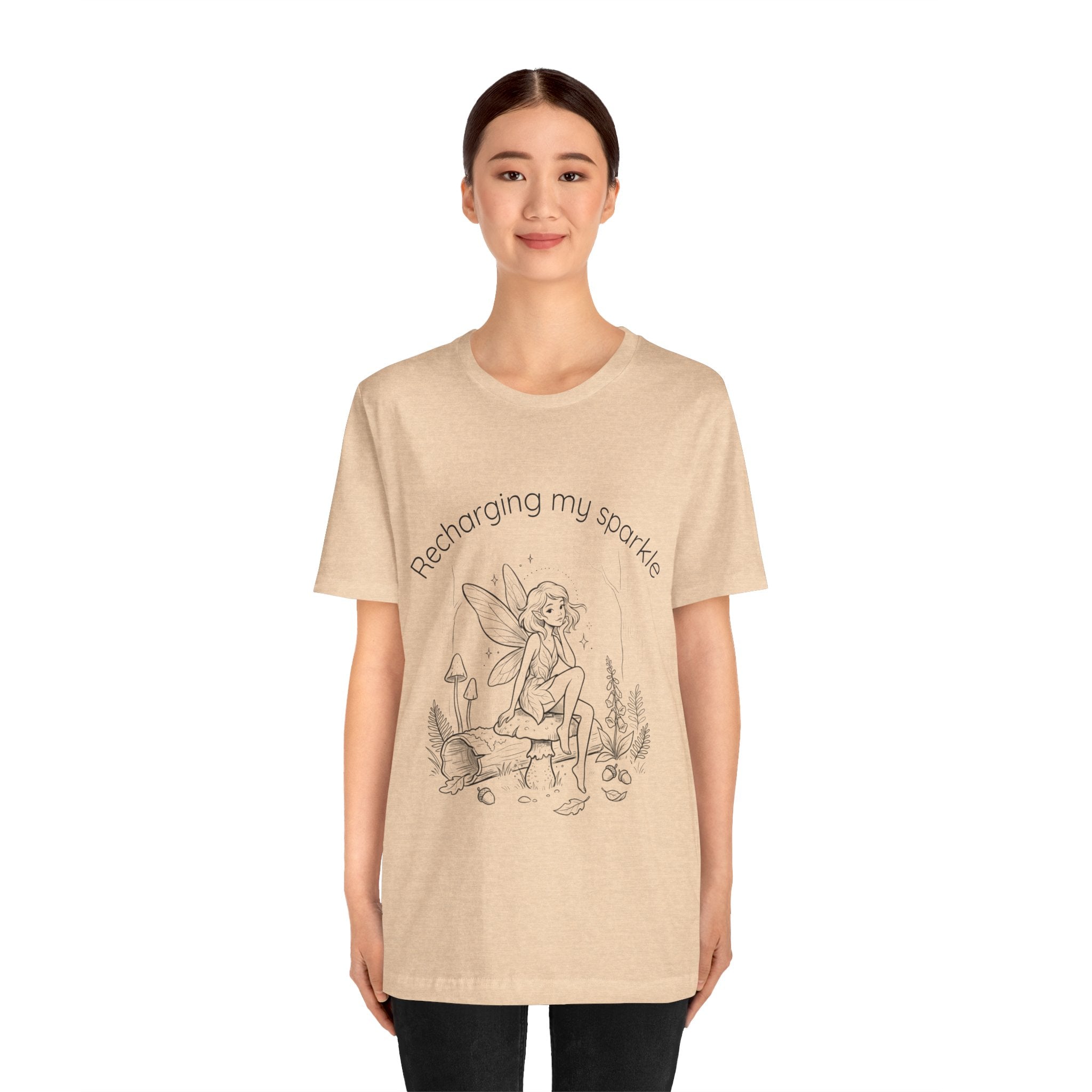 Vintage fairy graphic T-shirt with "Recharging My Sparkle" slogan, featuring a whimsical fairy design on a Printify T-shirt.