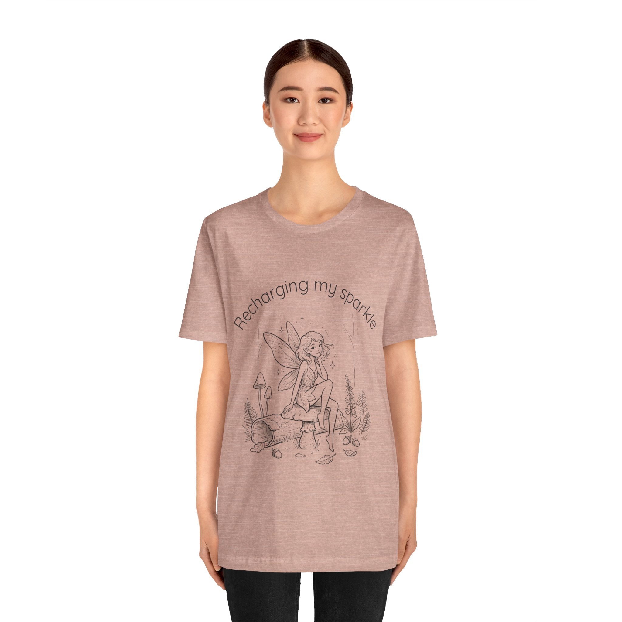 Vintage fairy graphic T-shirt with "Recharging My Sparkle" slogan, featuring a whimsical fairy design on a printed T-shirt.