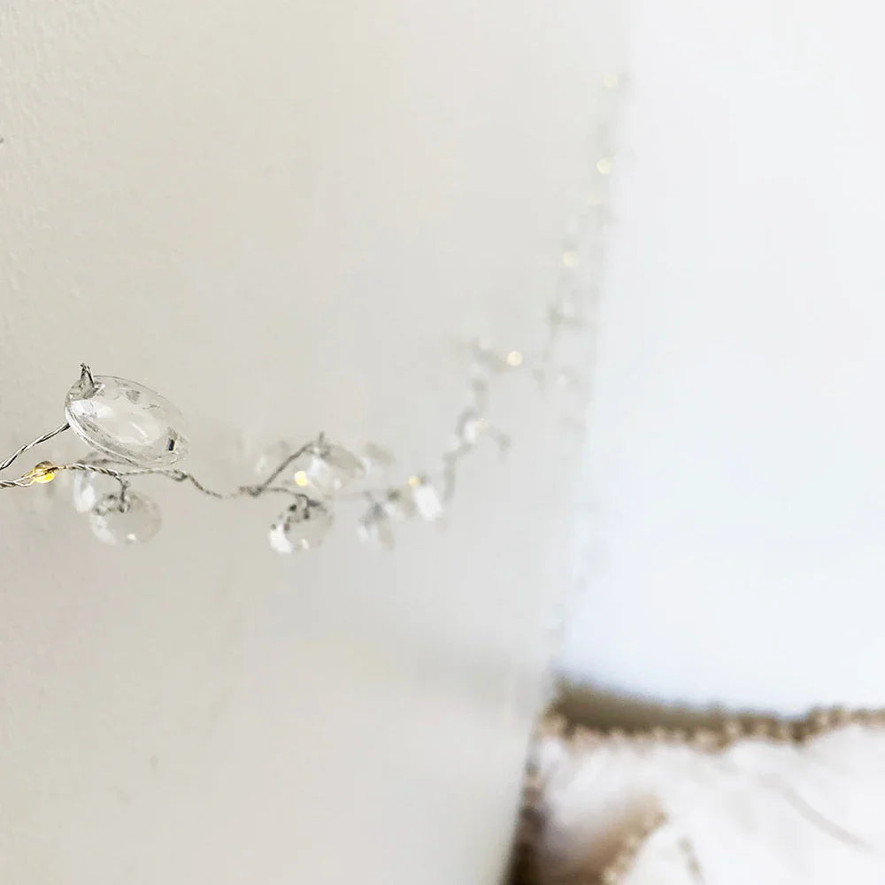 Close-up of Perfect Holiday Enchanted Crystal Gemstone Fairy Lights, 40 LED battery-operated string lights with shimmering crystal accents.