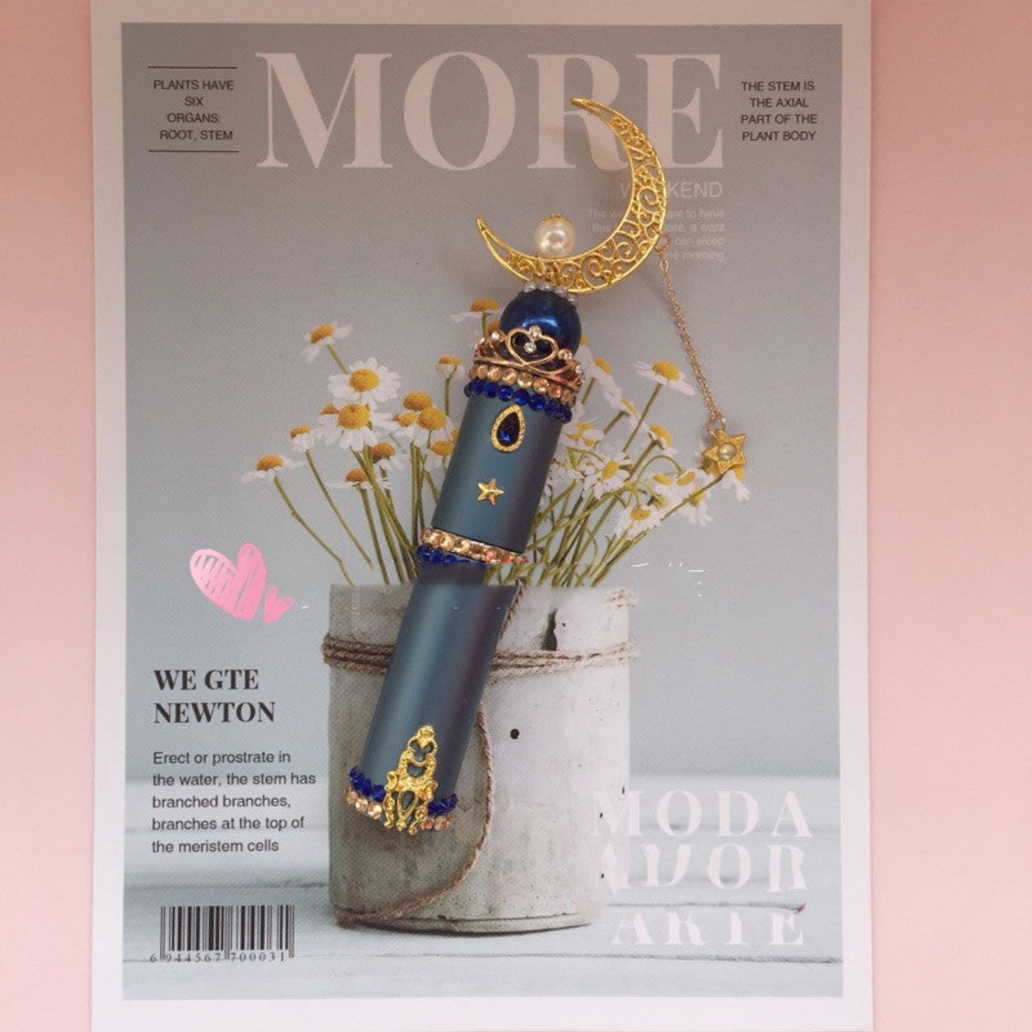 Ornate glass Sailor Moon perfume bottle by 24 Hour Crafts, featuring a blue collectible fragrance vessel with detailed design.