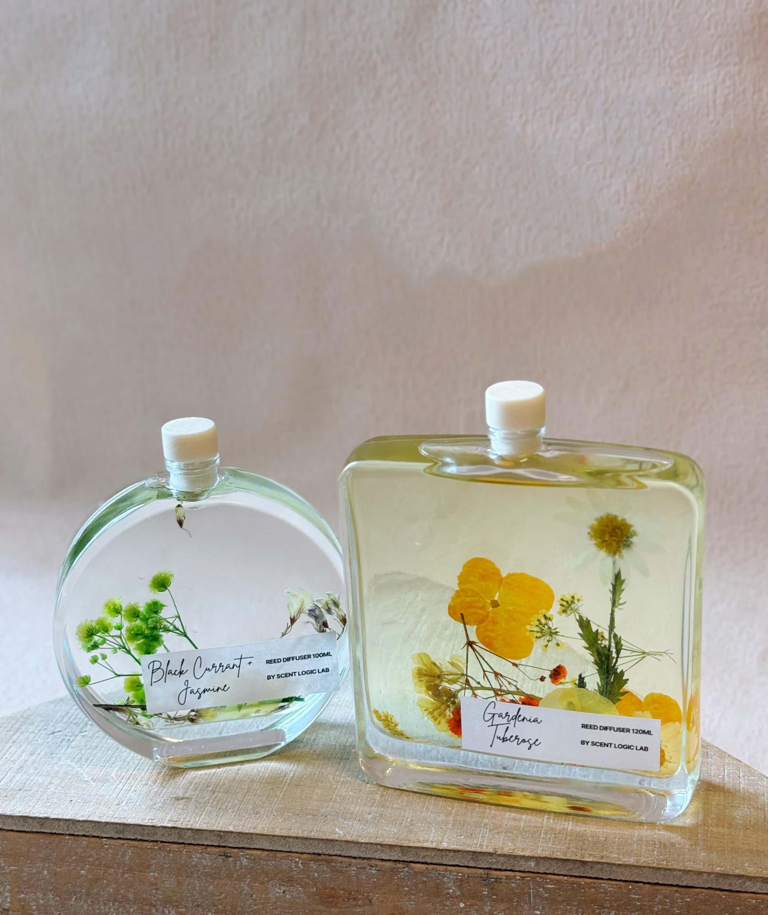 Botanical reed diffuser by Crazy About Candles, Lumenwood Apothecary Essence, 100 ml, with natural botanical fragrance and decorative glass container.