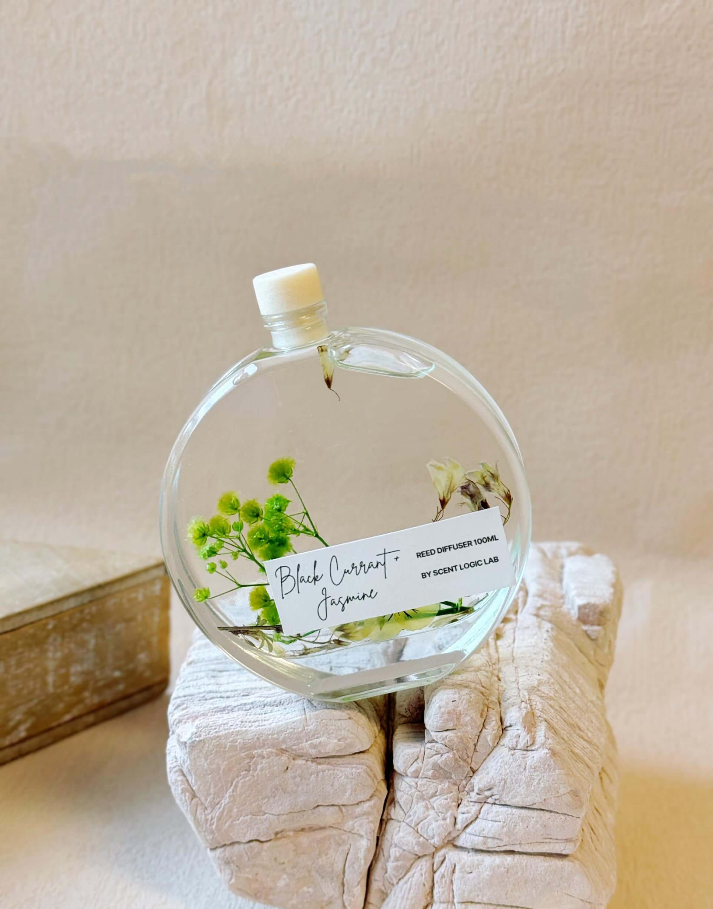 Handmade Lumenwood Apothecary reed diffuser with botanical design in a 100 ml bottle for home fragrance and decor.