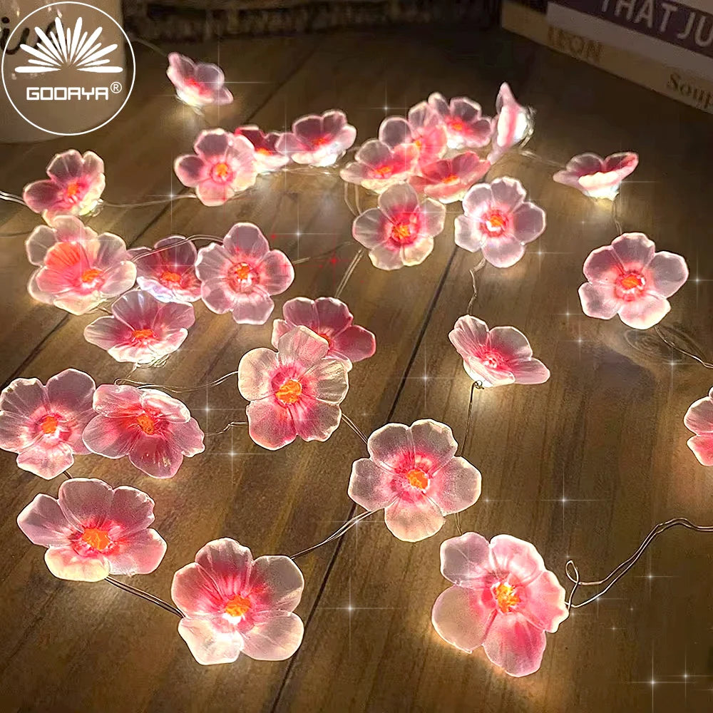 Cherry blossom fairy string lights with 20 LED bulbs, battery-operated soft glow garland for home and holiday decor.