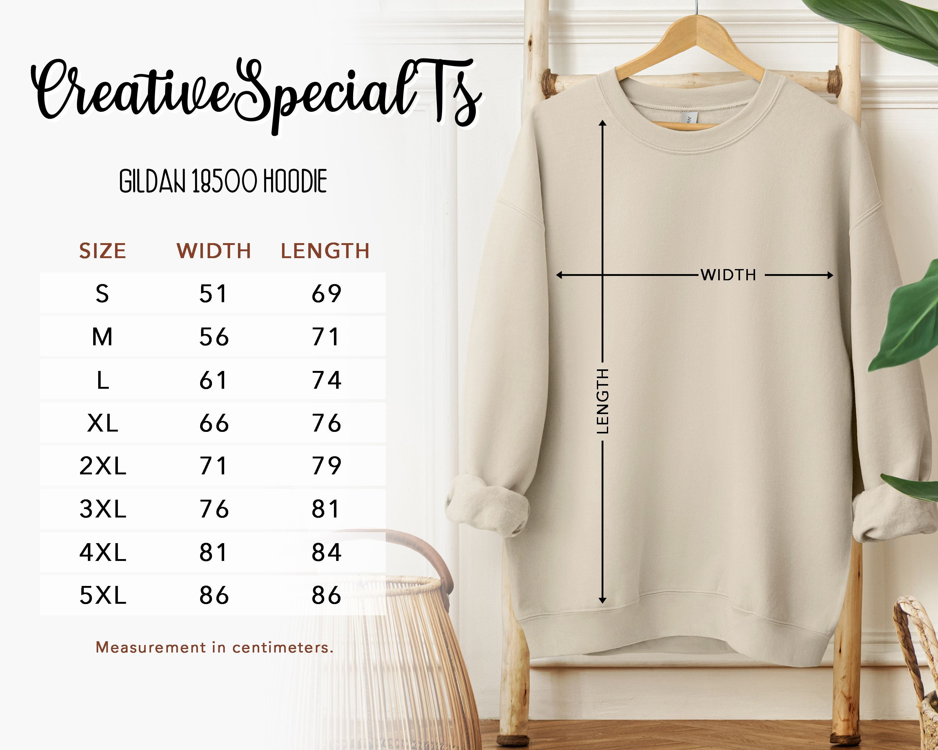 Back view of Golden Cottage Sunflower Hoodie by CreativeSpecialTs showing sunflower graphic and sizing chart.