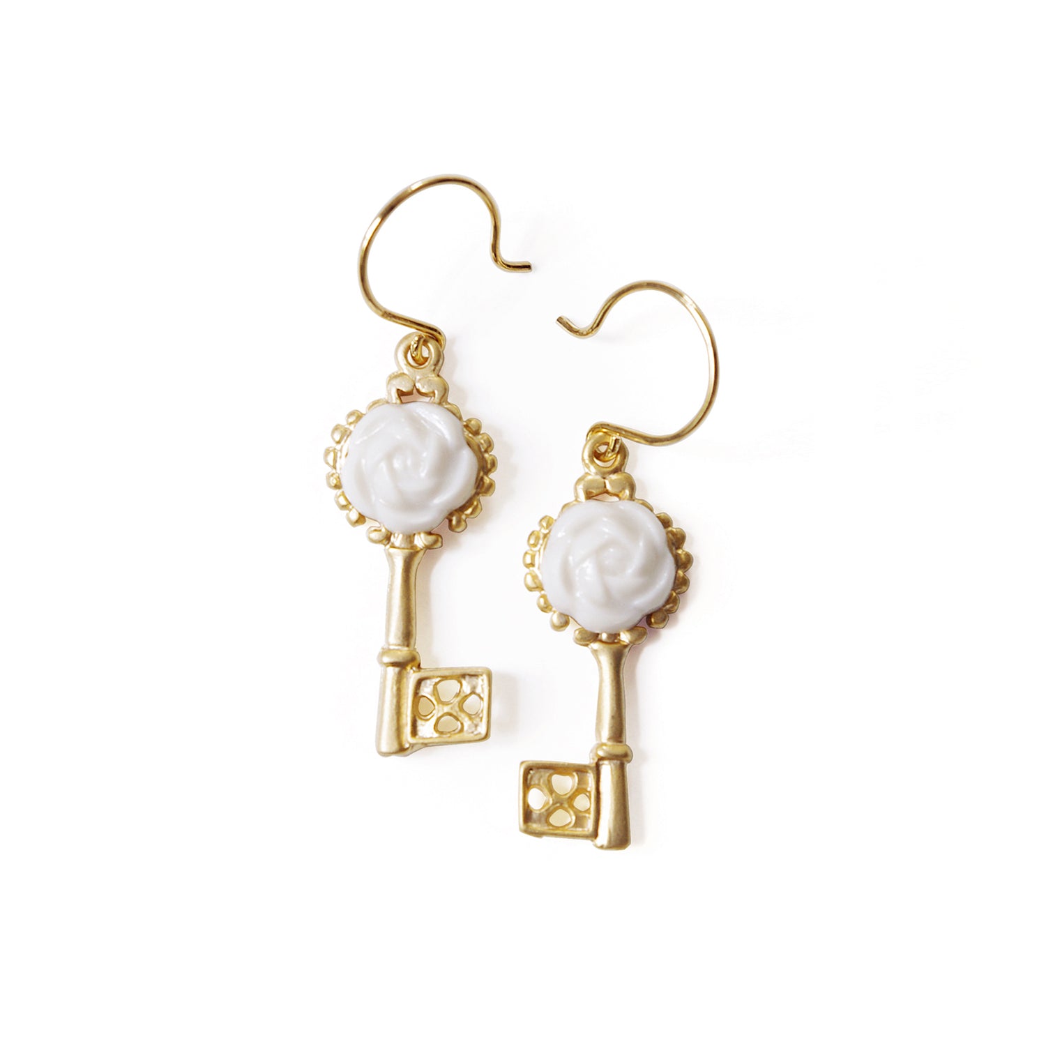 Golden porcelain Camellia earrings with gold accents from POPORCELAIN's Rosehaven Secret Garden jewelry collection.