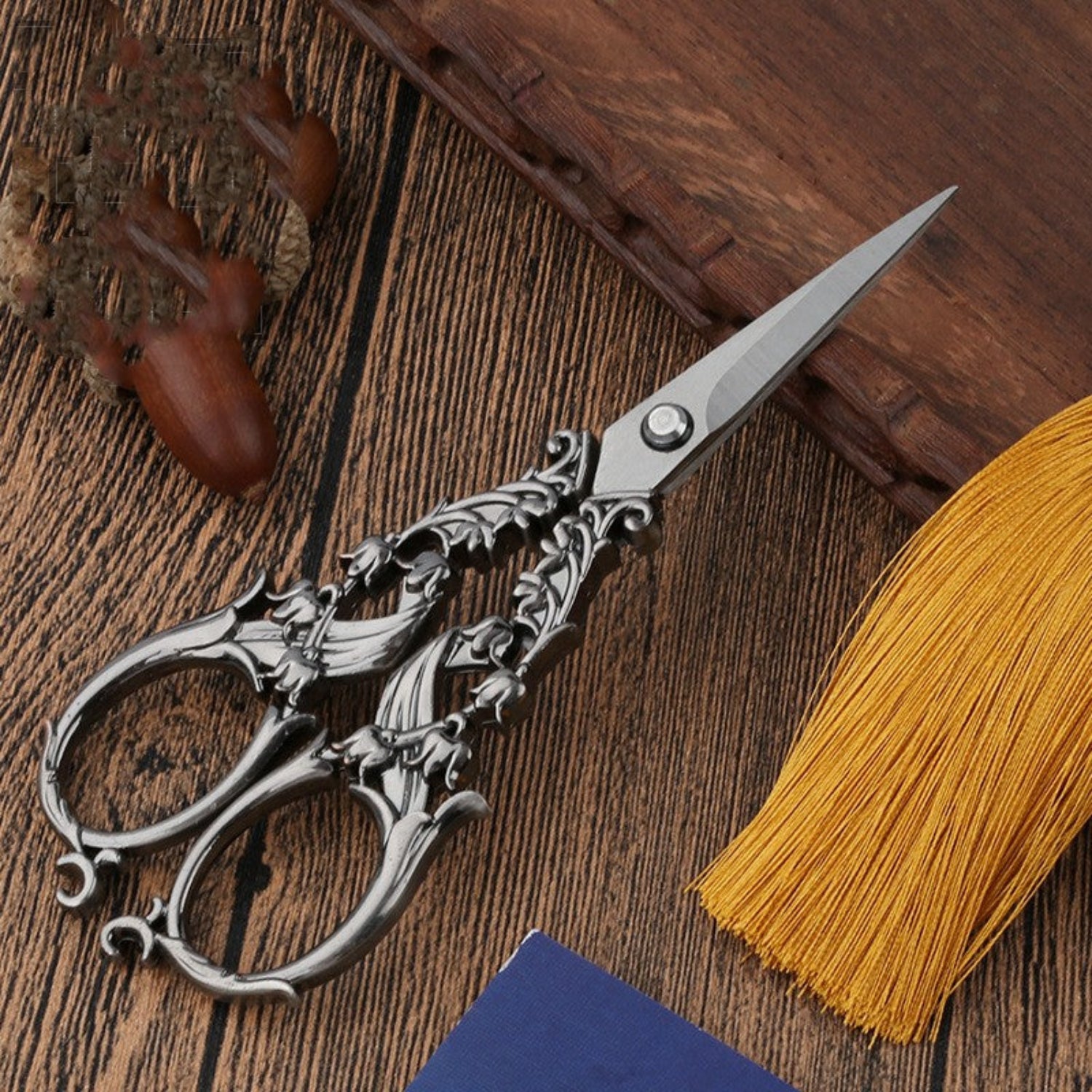 Vintage Bell Flower stainless steel craft scissors with ornate gunmetal finish, ideal for embroidery and detailed sewing projects.