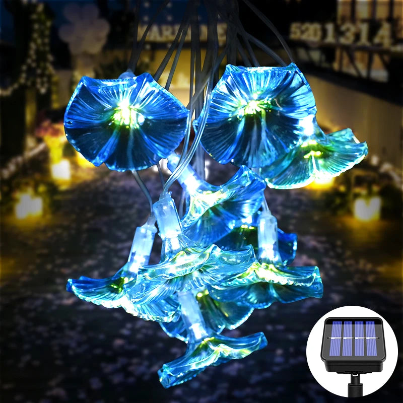 Solar Morning Glory Fairy Garden Lights with 10 LED floral glow, decorative outdoor lighting for garden and patio decor.