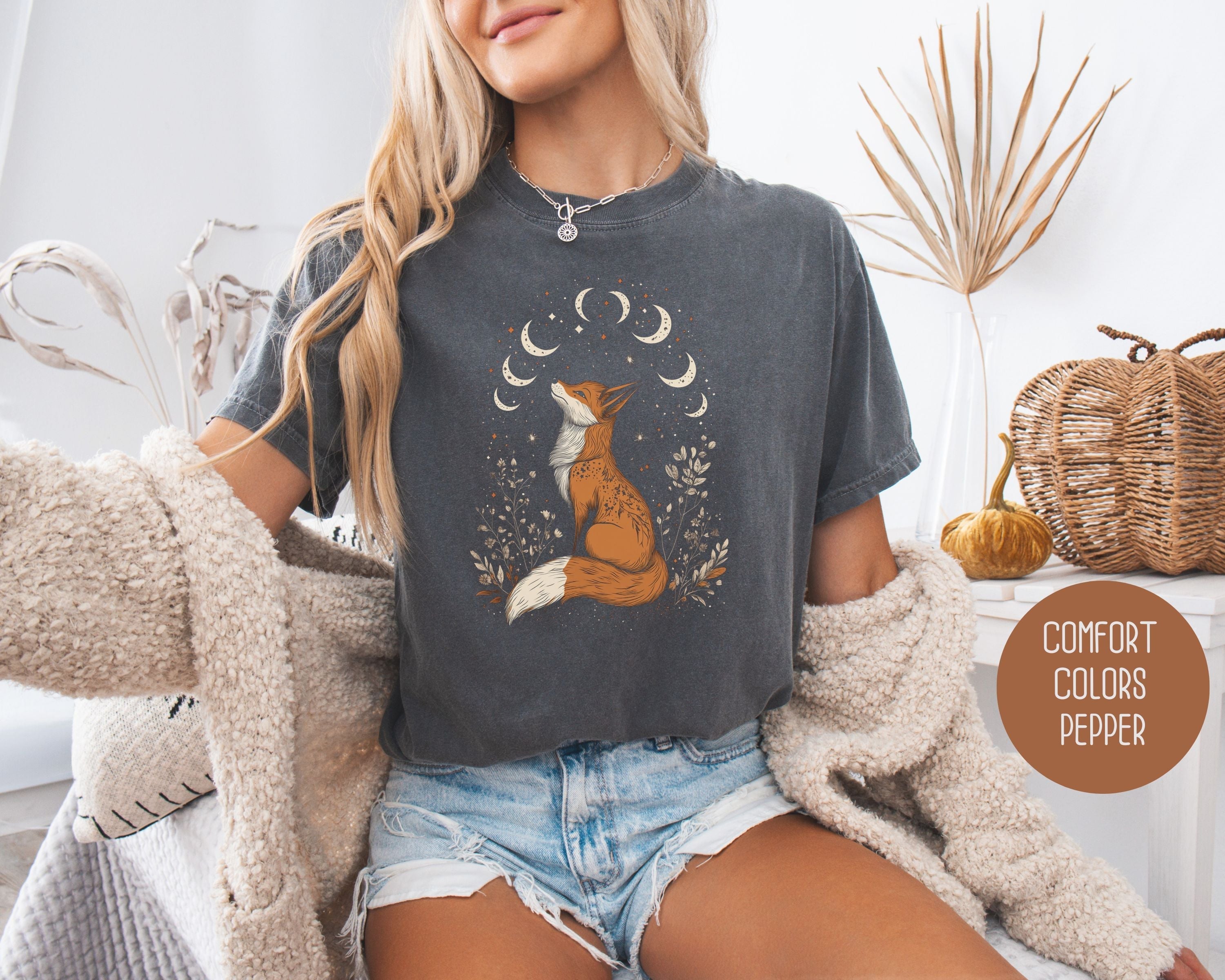 Cream-colored Celestial Fox Cottagecore T-Shirt by CreativeSpecialTs featuring a whimsical fox and celestial design on soft cotton fabric