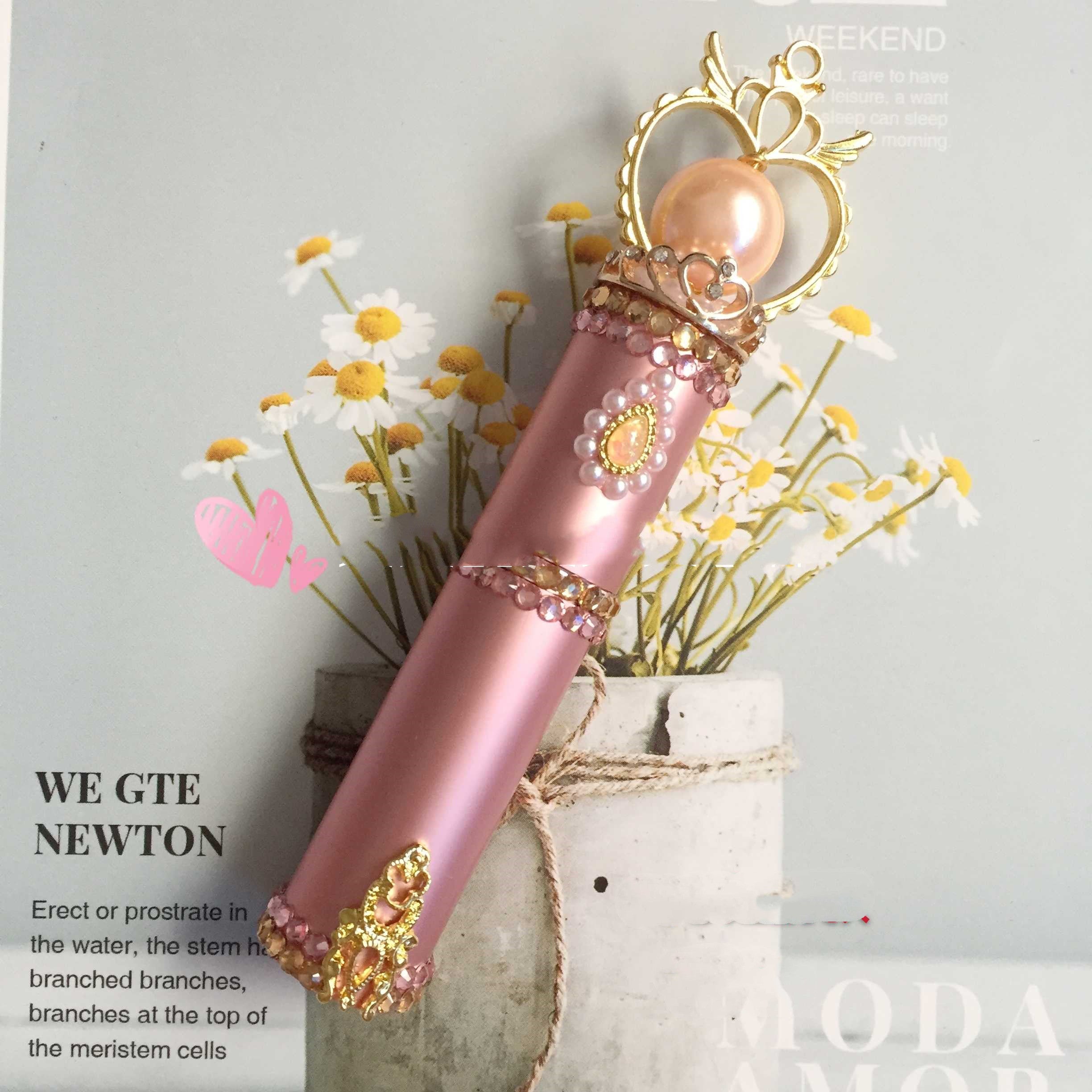 Pink Sailor Moon stick perfume bottle by 24 Hour Crafts, ornate glass collectible vessel with intricate design and magical theme.