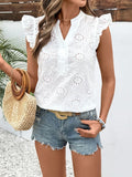 White floral Rosehaven eyelet ruffle cap sleeve blouse by Trendsi, shown from the front with delicate eyelet details and ruffle accents.