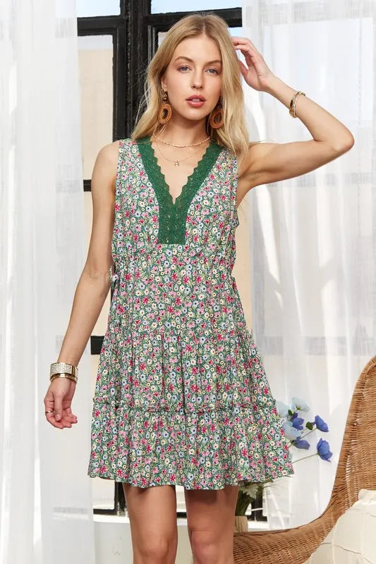Front view of the Rosehaven Lace Garden Dress by Trendsi, featuring intricate lace details and a flowy, elegant design.