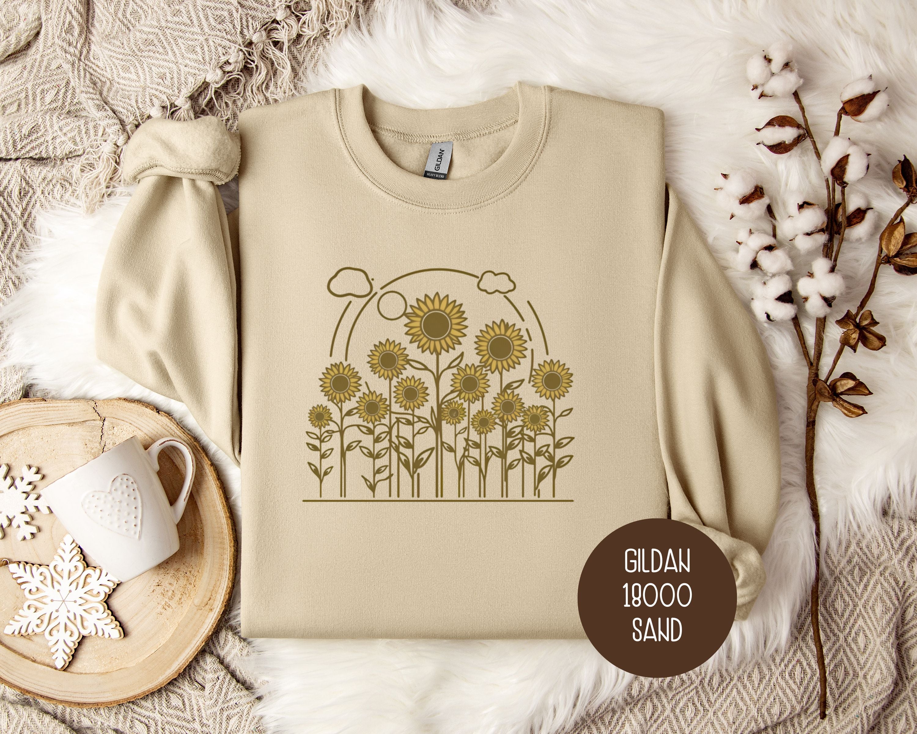 Vintage sunflower cottagecore sweatshirt by CreativeSpecialTs featuring a cozy design with sunflower pattern and soft fabric.