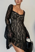Elegant Starlit Hollow Lace Spell Dress by Trendsi featuring bell sleeves and intricate lace details on a flowing dress.