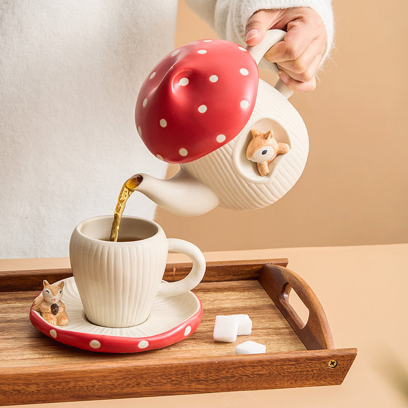 Woodland Mushroom ceramic tea set featuring a toadstool teapot and matching cup by 24 Hour Crafts, perfect for charming tea moments.