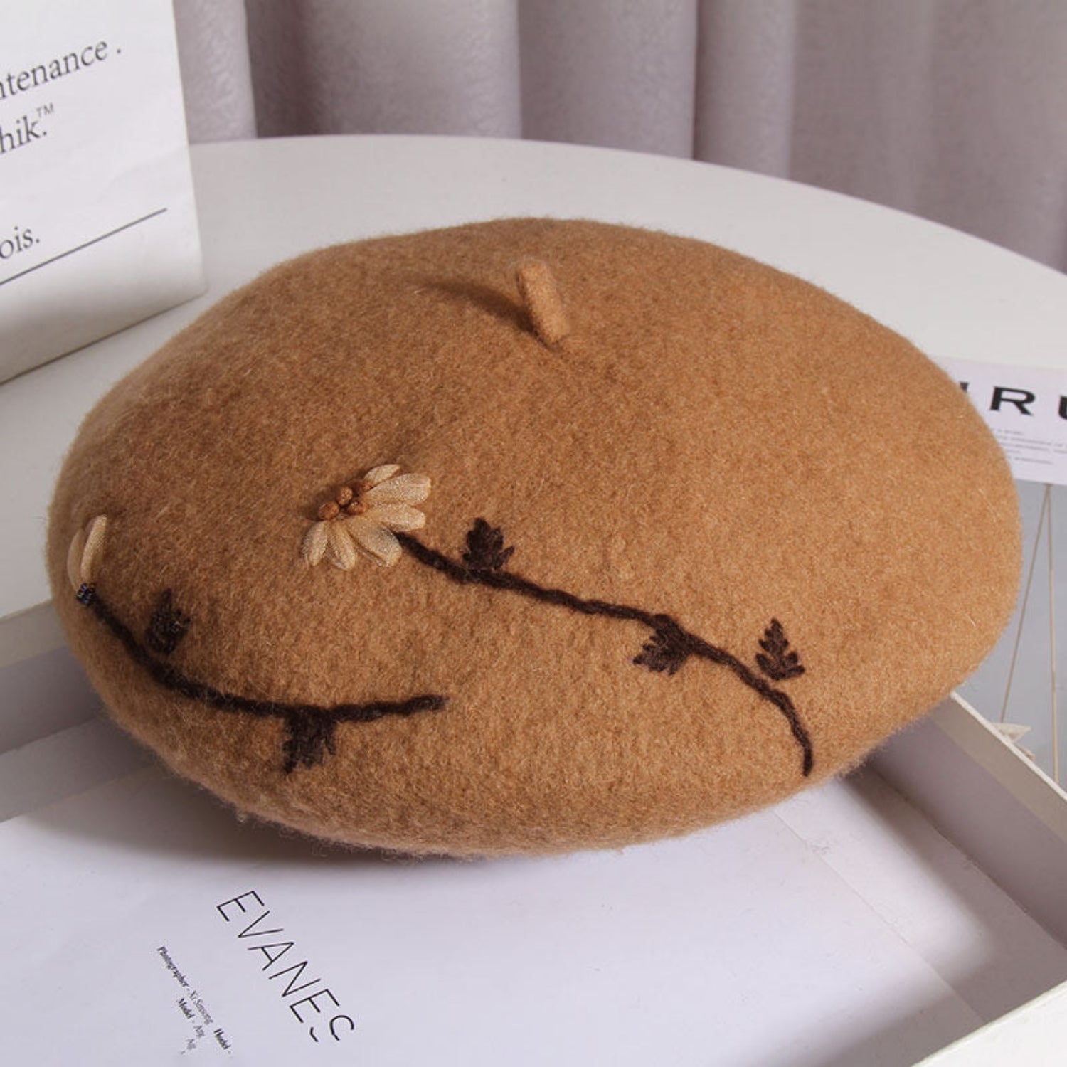 Warm honey brown mushroom meadow daisy beret with embroidered daisies and soft rounded shape, perfect for cottagecore fashion.