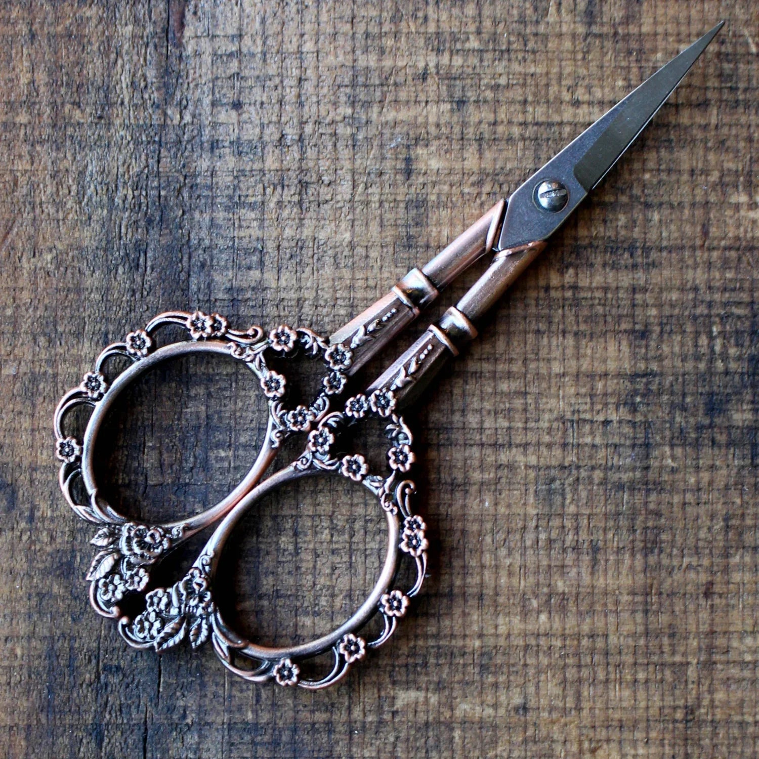 Antique copper Victorian floral craft scissors with ornate scrollwork design, ideal for sewing and craft projects by Mountaintop Yarn.