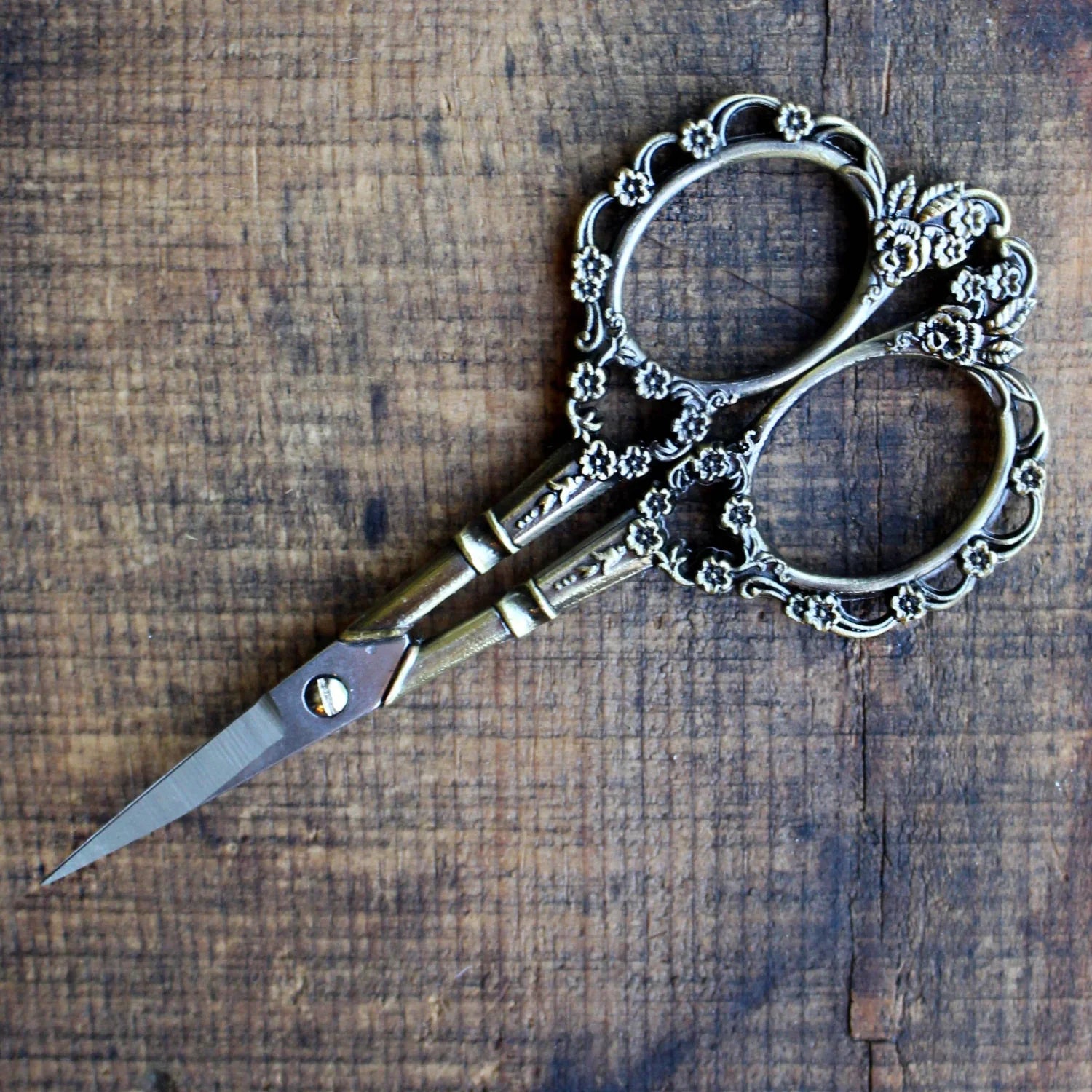 Antique gold Victorian floral craft scissors with scrollwork design, perfect for sewing and craft projects by Mountaintop Yarn.