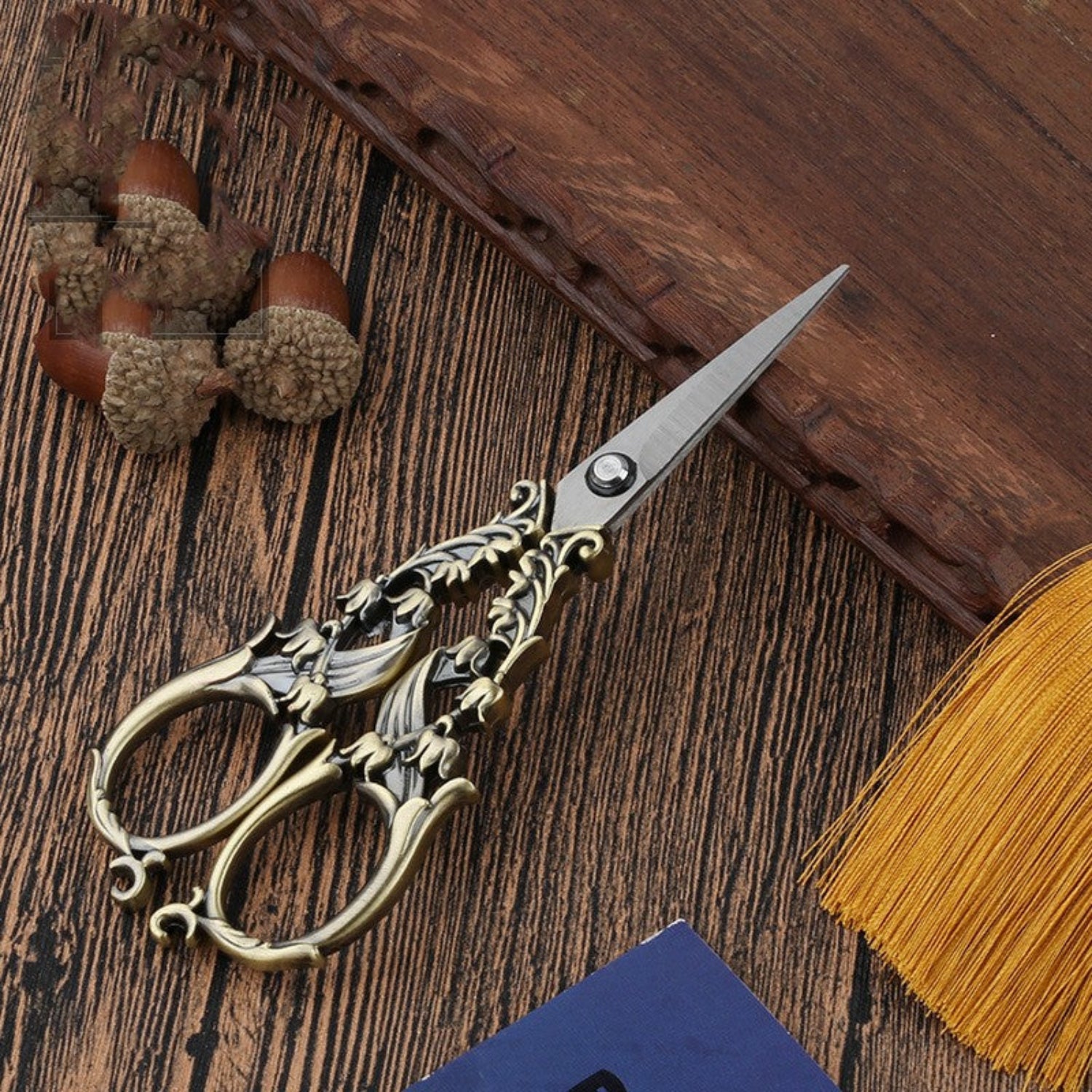 Vintage bronze Bell Flower stainless steel craft scissors with intricate floral design, ideal for embroidery and fabric cutting.