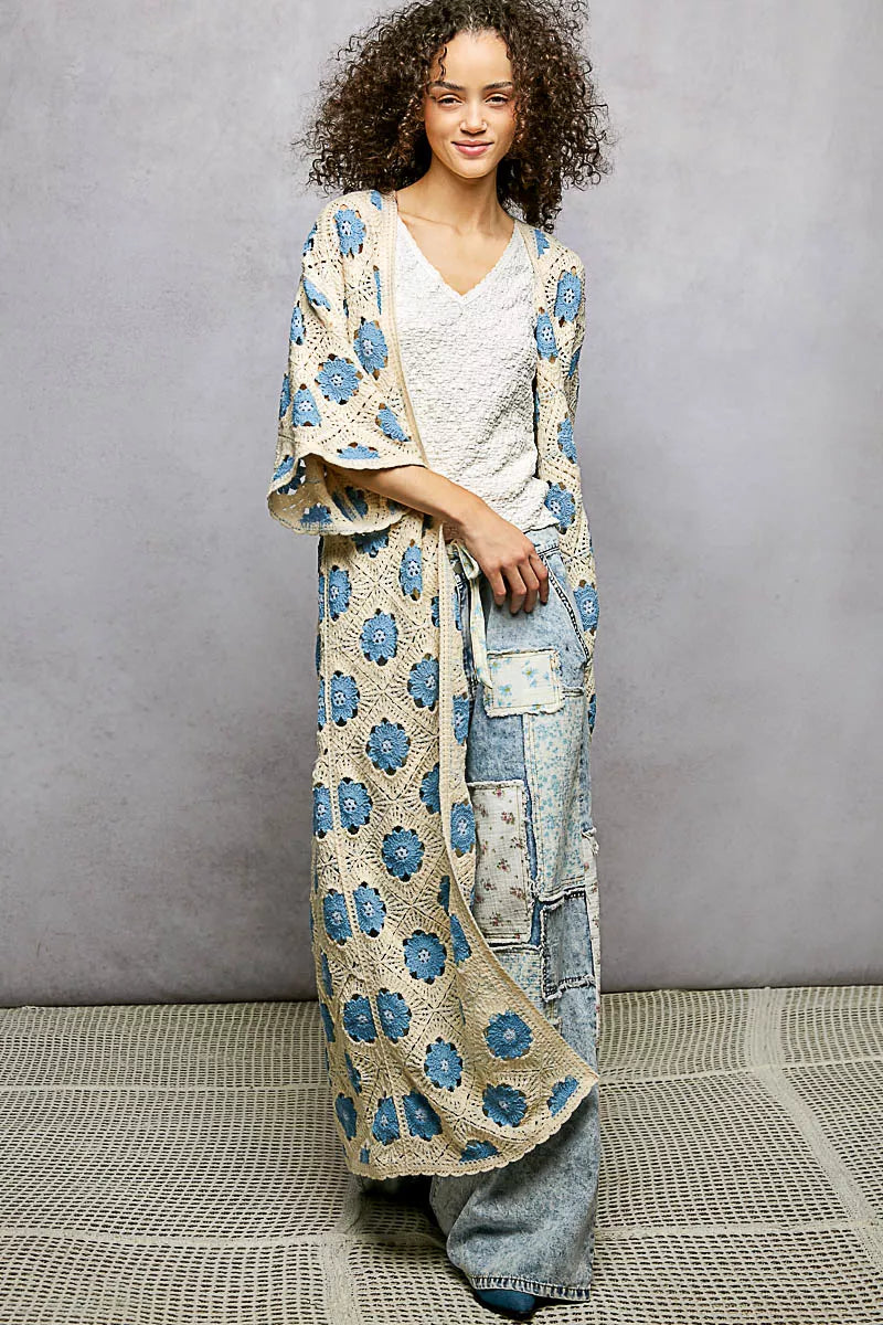 Rosehaven crochet garden cardigan by Trendsi, featuring intricate crochet details and a cozy, stylish design.