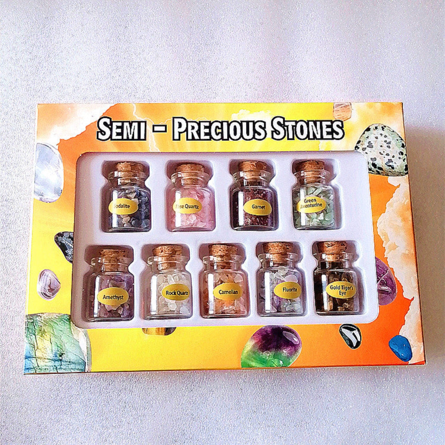 Mini wishing bottles with crushed crystals from 24 Hour Crafts, featuring colorful semi-precious stones in a magical apothecary craft set.