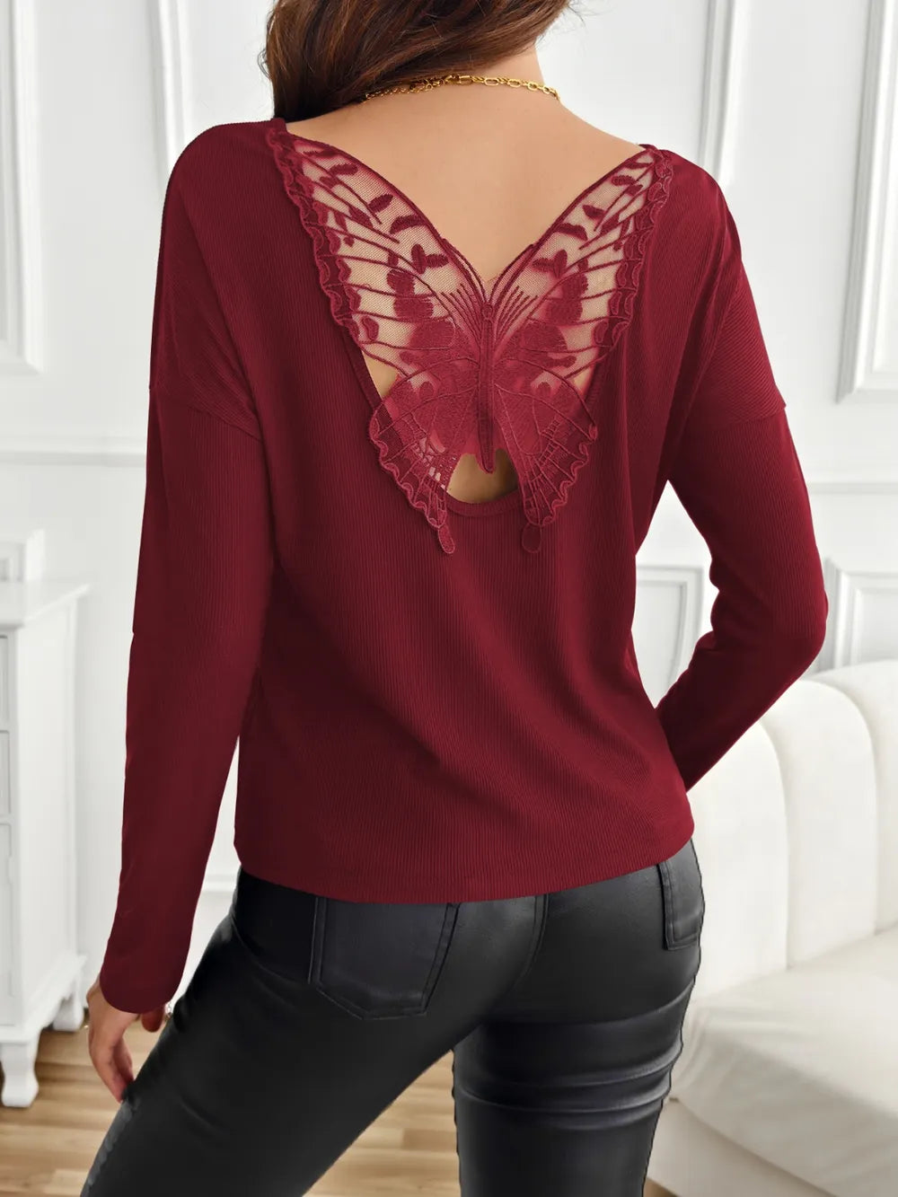 Semi-sheer lace detail long sleeve blouse with butterfly back from Trendsi, featuring elegant lace accents and a stylish, flowing fit.
