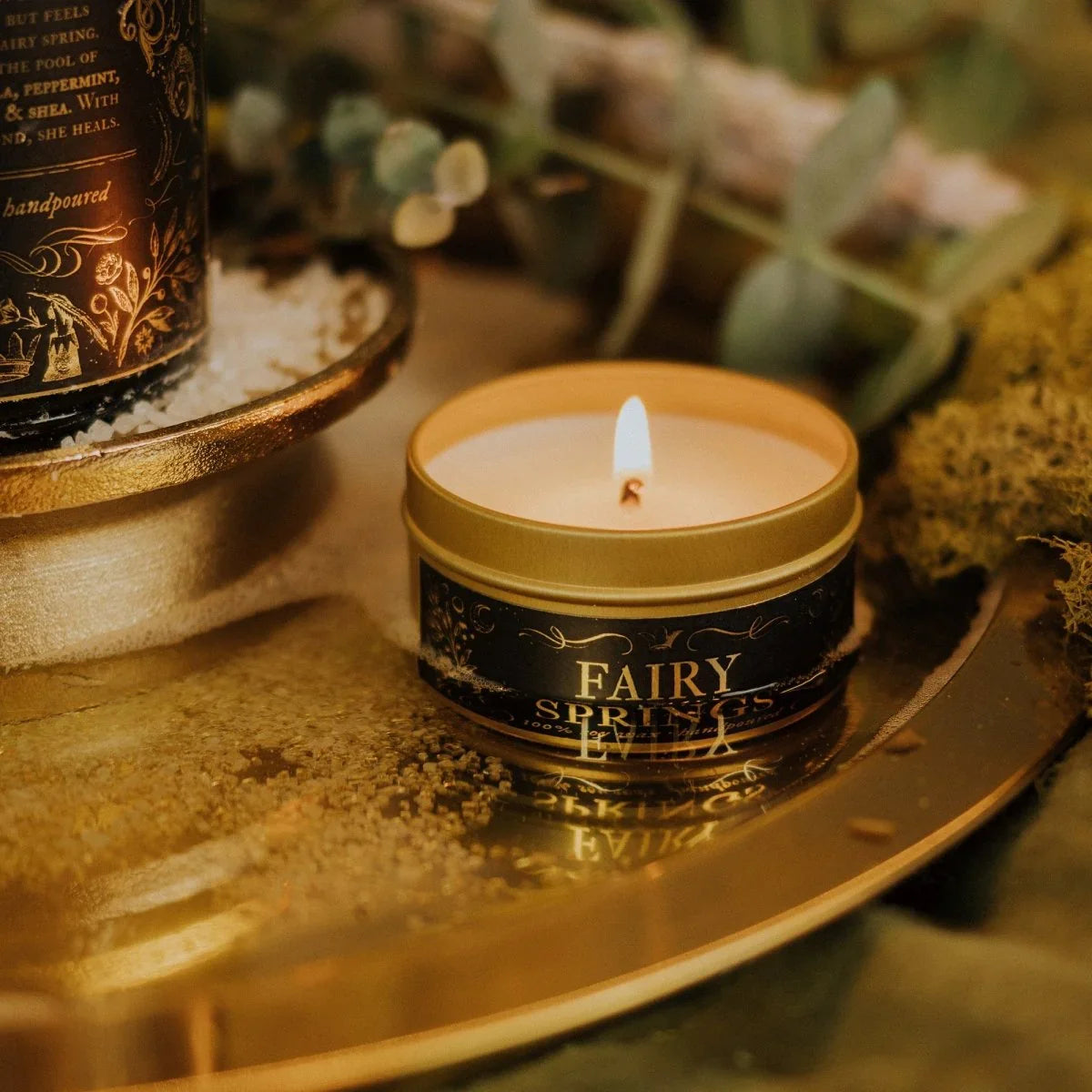 Phantom Row Fairy Springs Candle with glowing fairy and spring floral design, perfect for decorative candle displays.