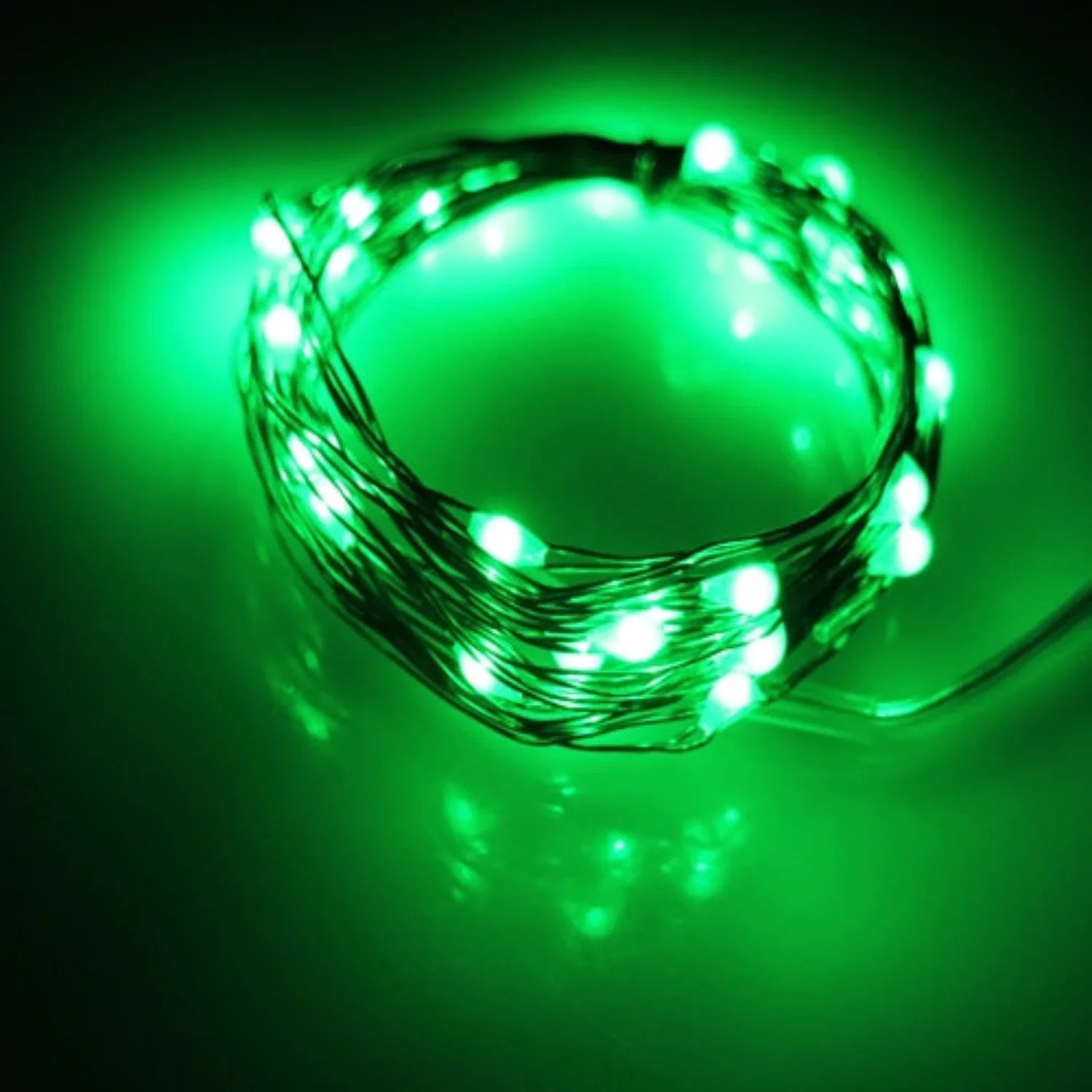 Silver copper fairy lights with 20 green LED bulbs, battery operated, perfect for decorative holiday lighting and accents.