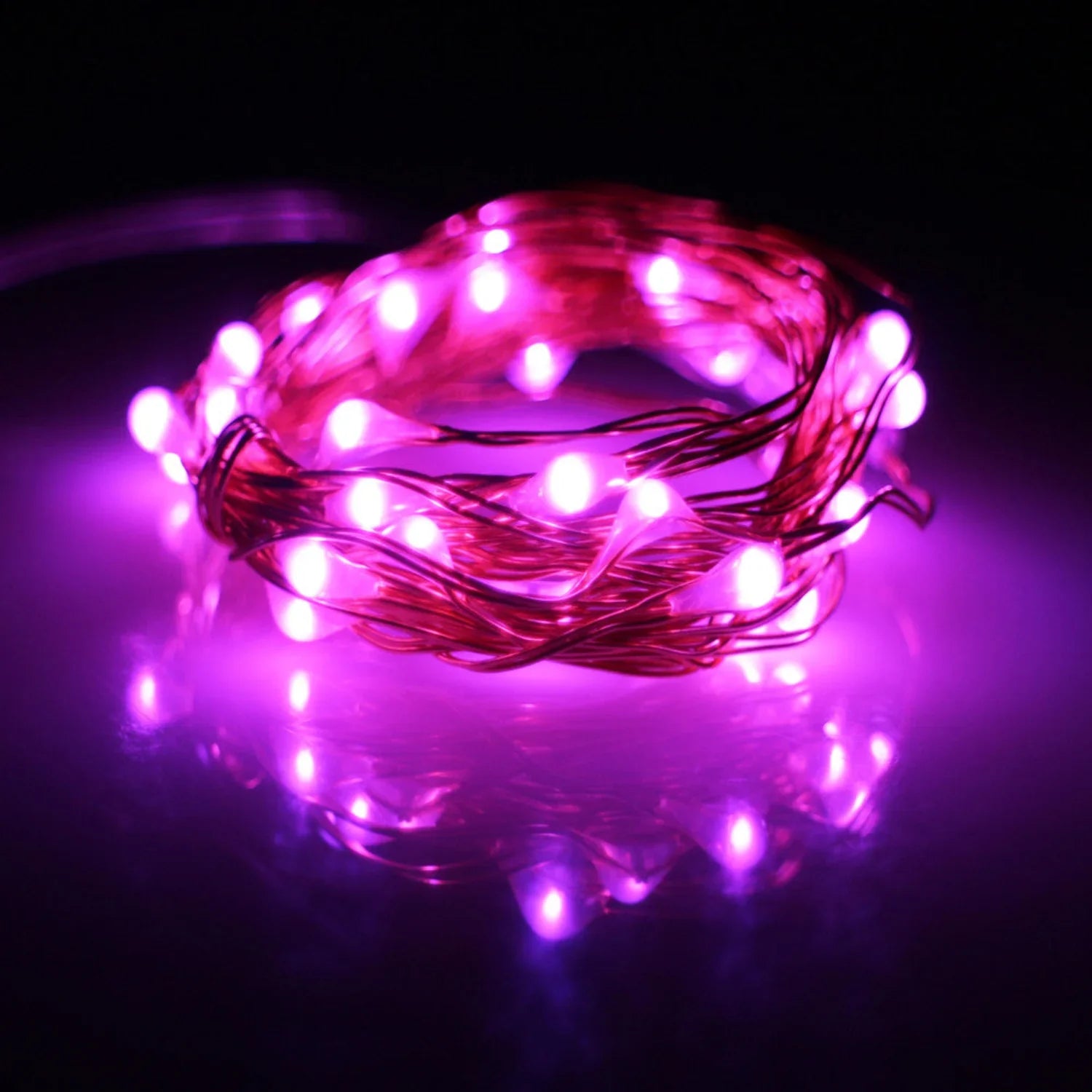 20 LED silver copper fairy lights by Perfect Holiday with a warm red glow, ideal for decorative lighting and ambiance.
