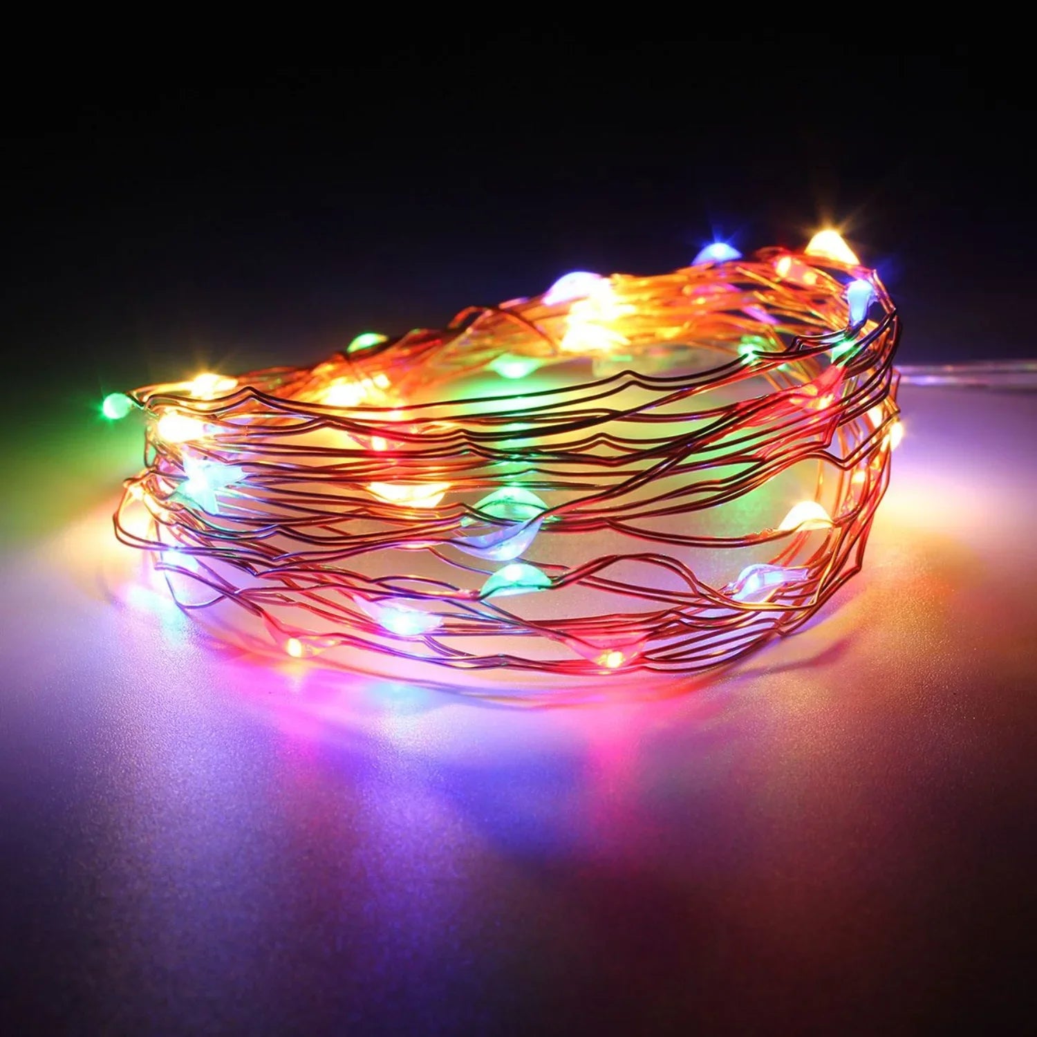 Colorful 20 LED silver copper fairy lights by Perfect Holiday, battery operated, perfect for decorative lighting.