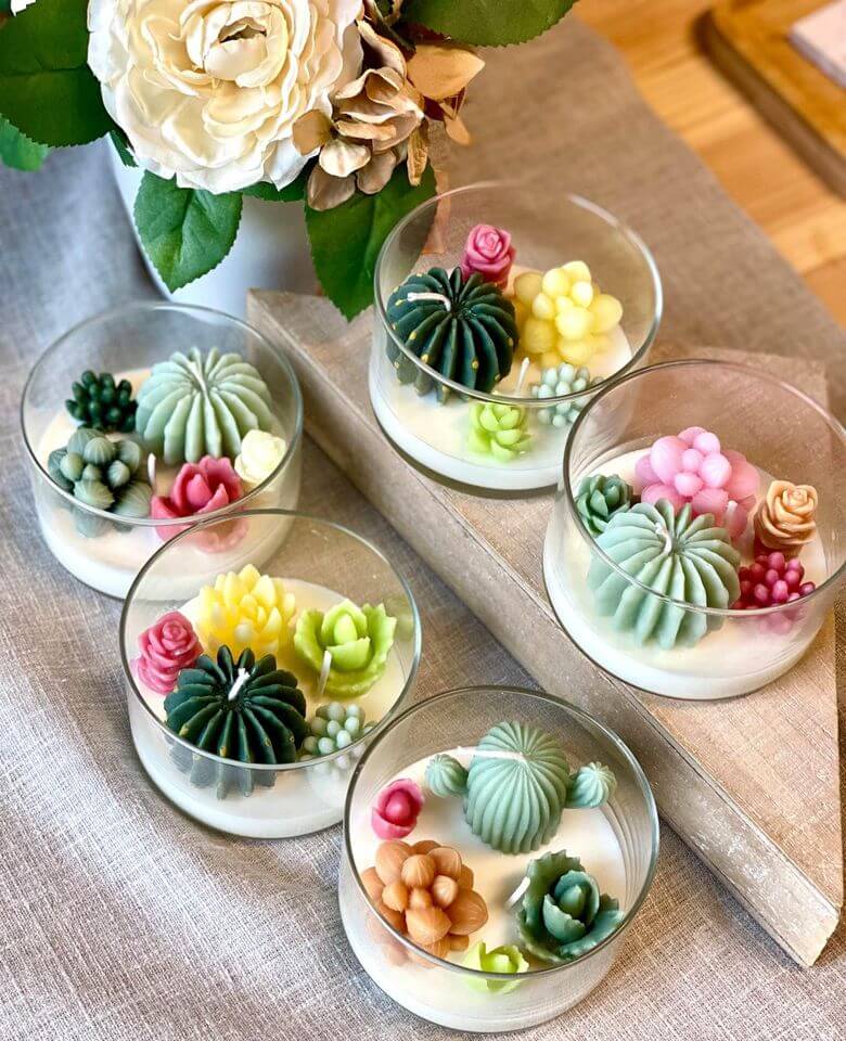 Handmade garden terrarium candle from Crazy About Candles with greenery and natural decor, perfect for home and garden ambiance.
