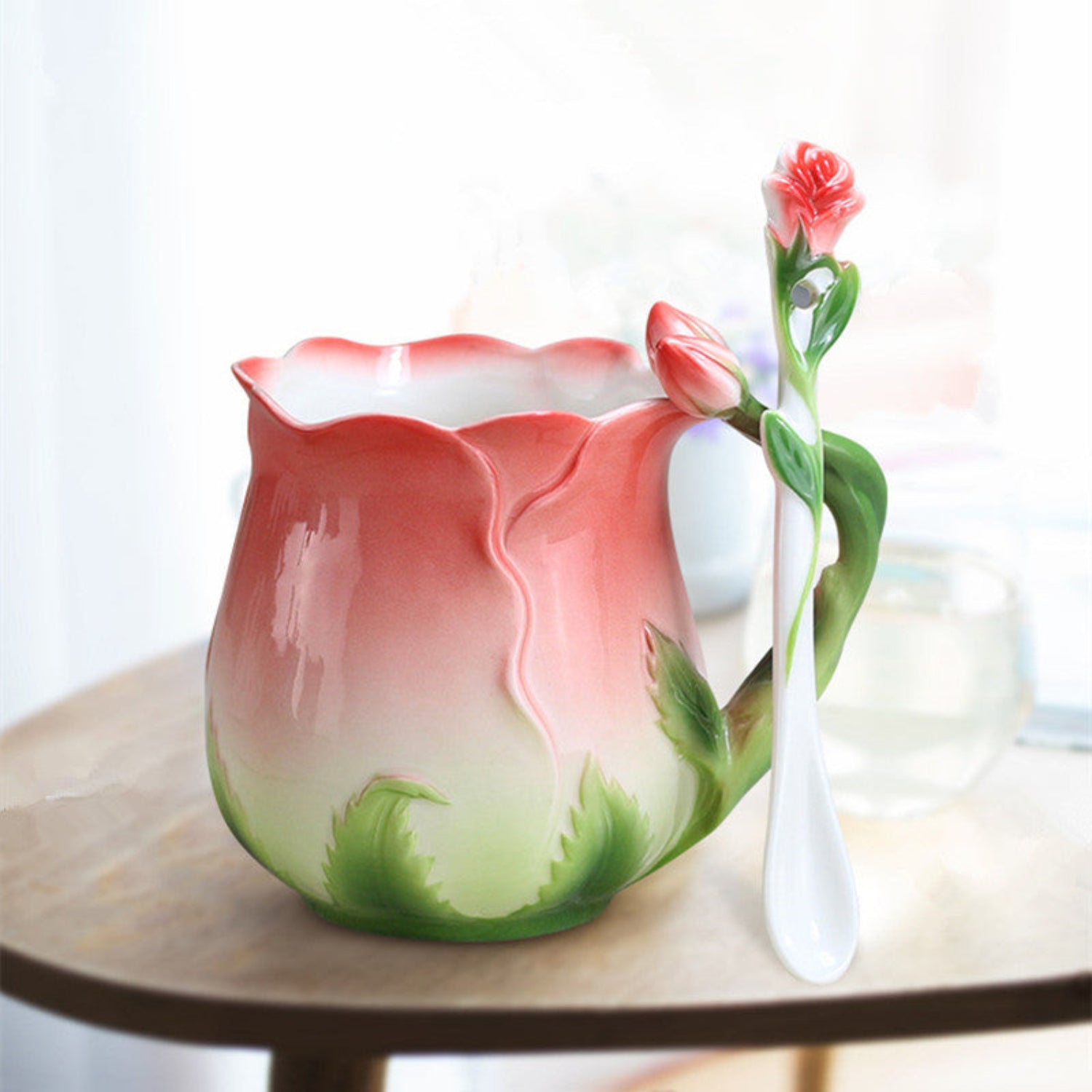 Vintage rose ceramic teacup with red rosebud design and floral stirrer, handmade by 24 Hour Crafts.