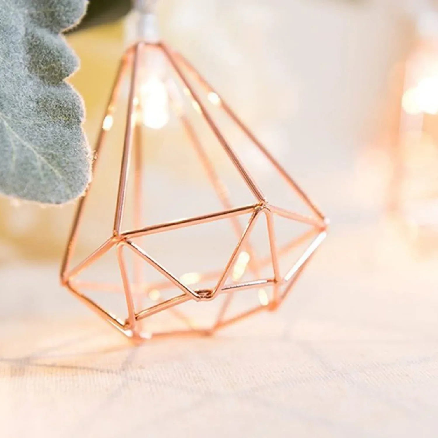 Rose gold diamond-shaped LED string fairy lights by Perfect Holiday, battery operated, perfect for decorative lighting.