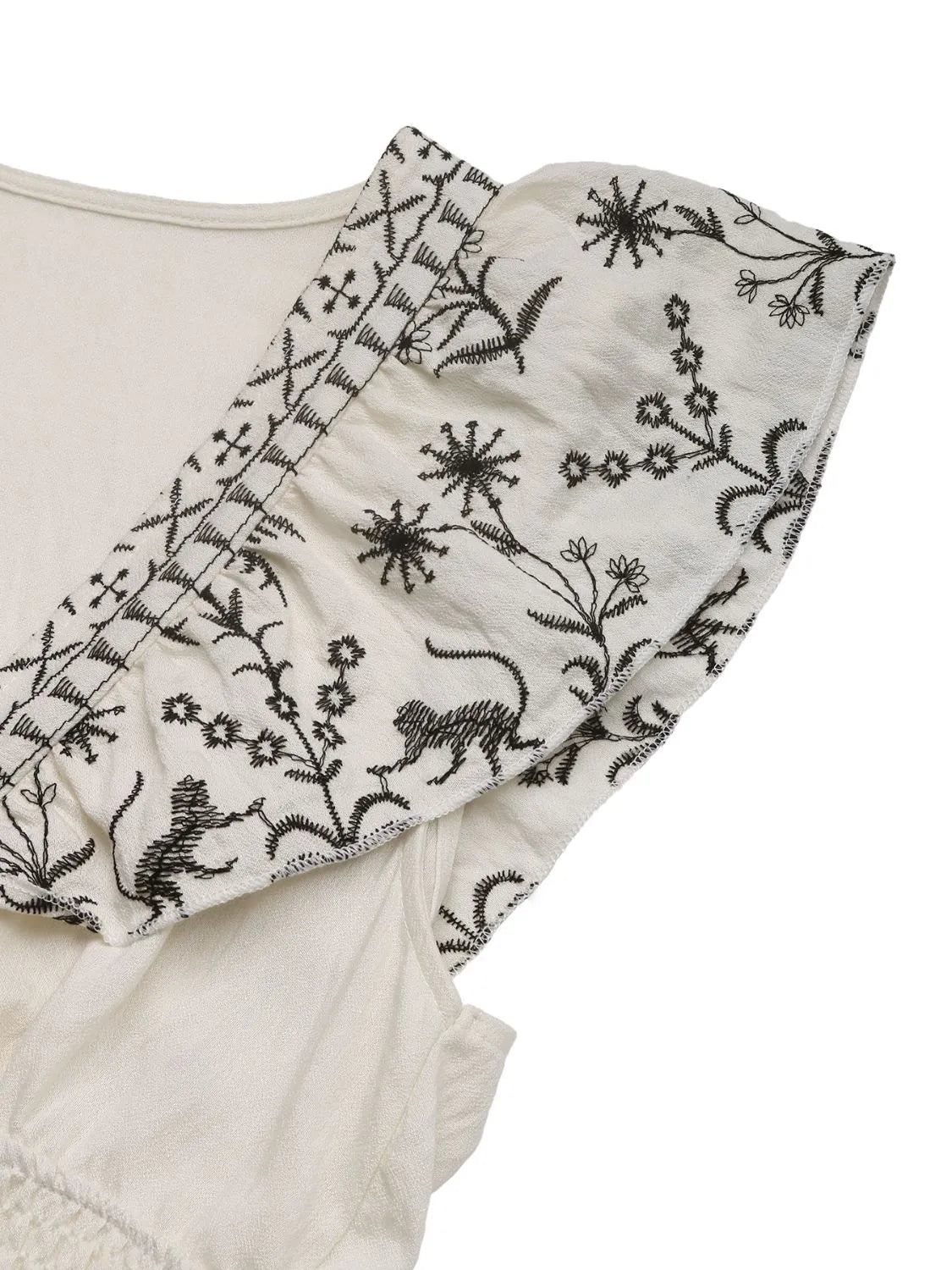 Cream Woodland Muse smocked mini dress with cap sleeves, stylish and comfortable for casual or semi-formal occasions.