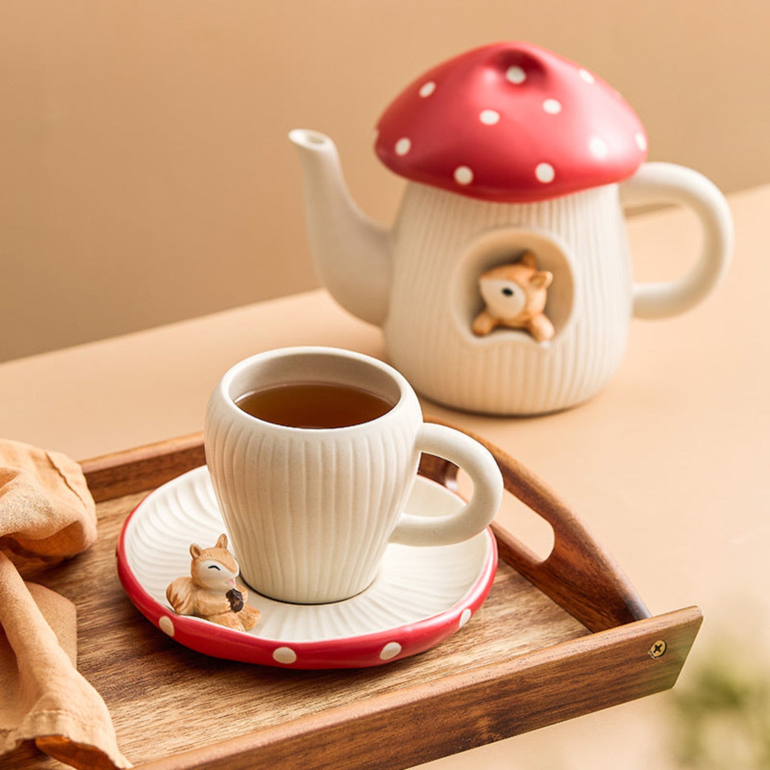 Woodland Mushroom ceramic tea set with toadstool-shaped teapot and matching cup by 24 Hour Crafts, featuring woodland mushroom design.